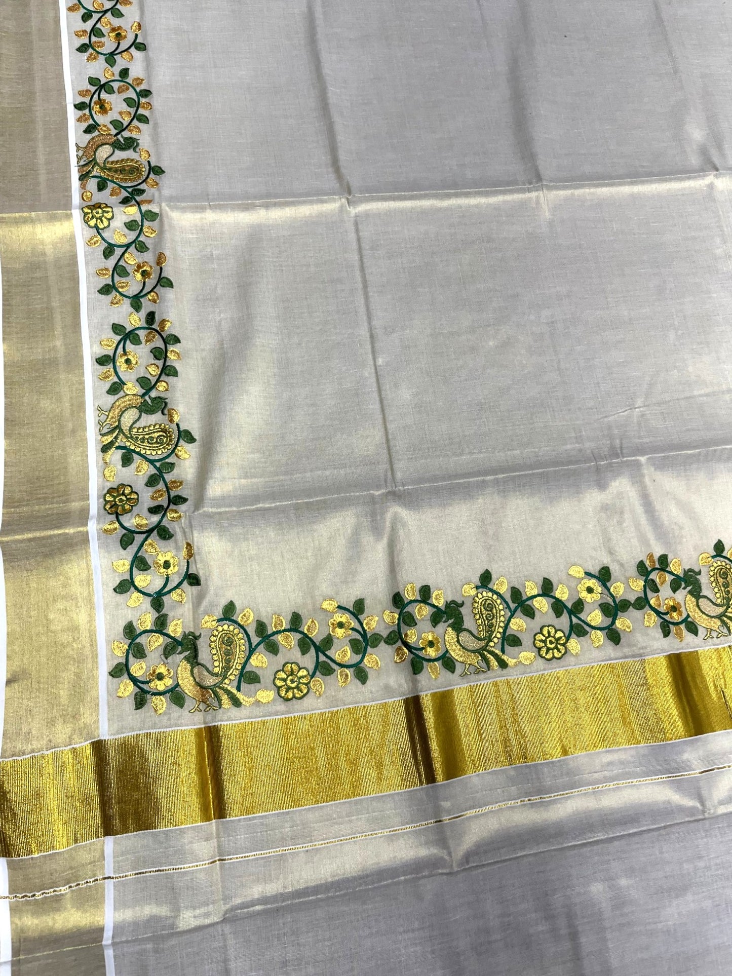 Southloom Kerala Tissue Kasavu Saree with Green And Golden Peacock Embroidery Works