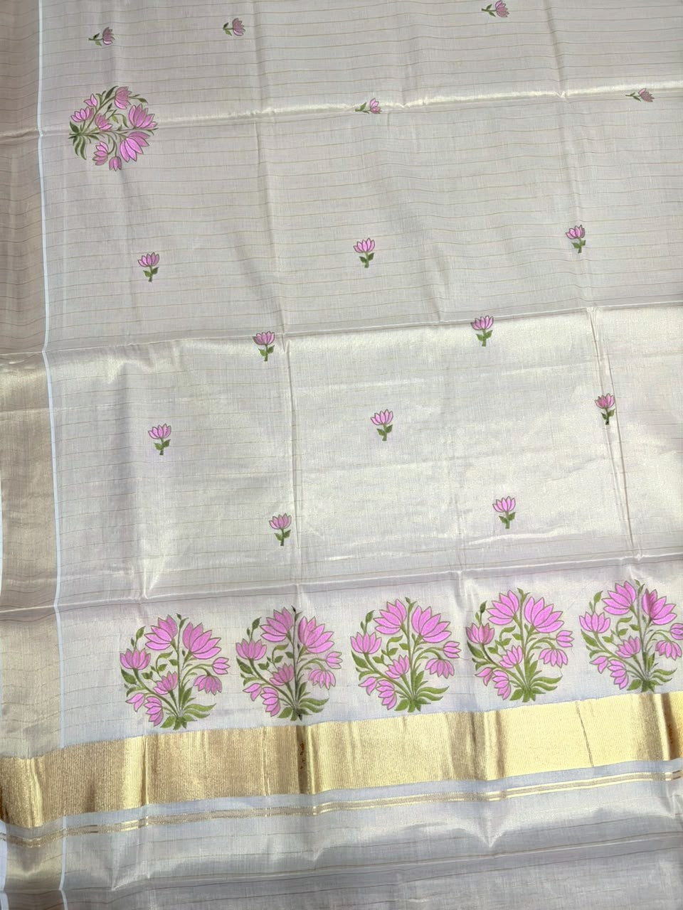 Southloom Tissue Kerala Kasavu Saree with Floral Embroidery Design On Border