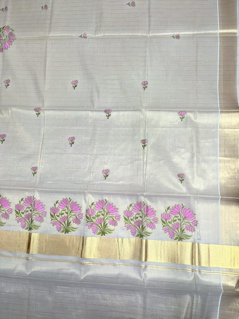 Southloom Tissue Kerala Kasavu Saree with Floral Embroidery Design On Border