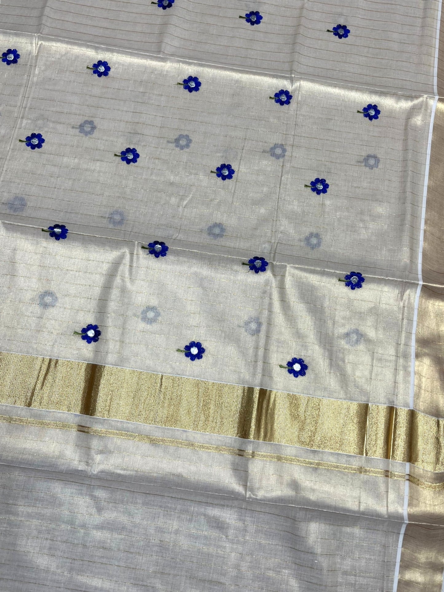 Southloom Kerala Tissue Kasavu Lines Saree with Blue Floral Embroidery Work on Body