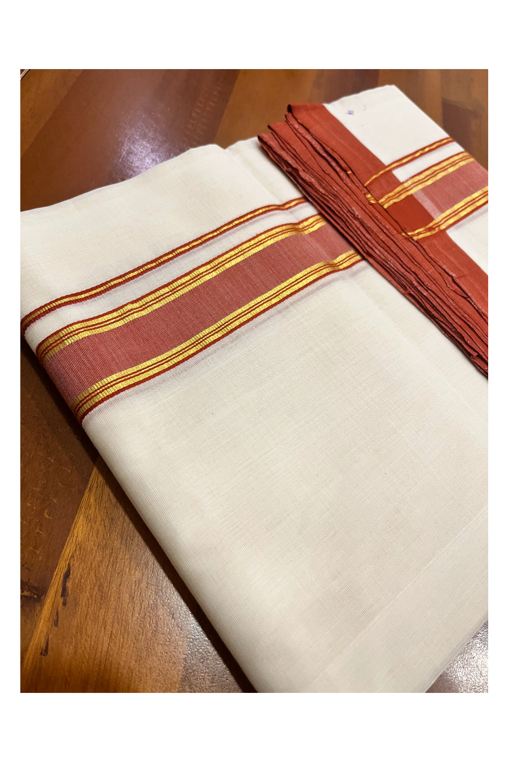 Southloom Premium Balaramapuram Unakkupaavu Handloom Kasavu Mundu with Orange Border (South Indian Kerala Dhoti)