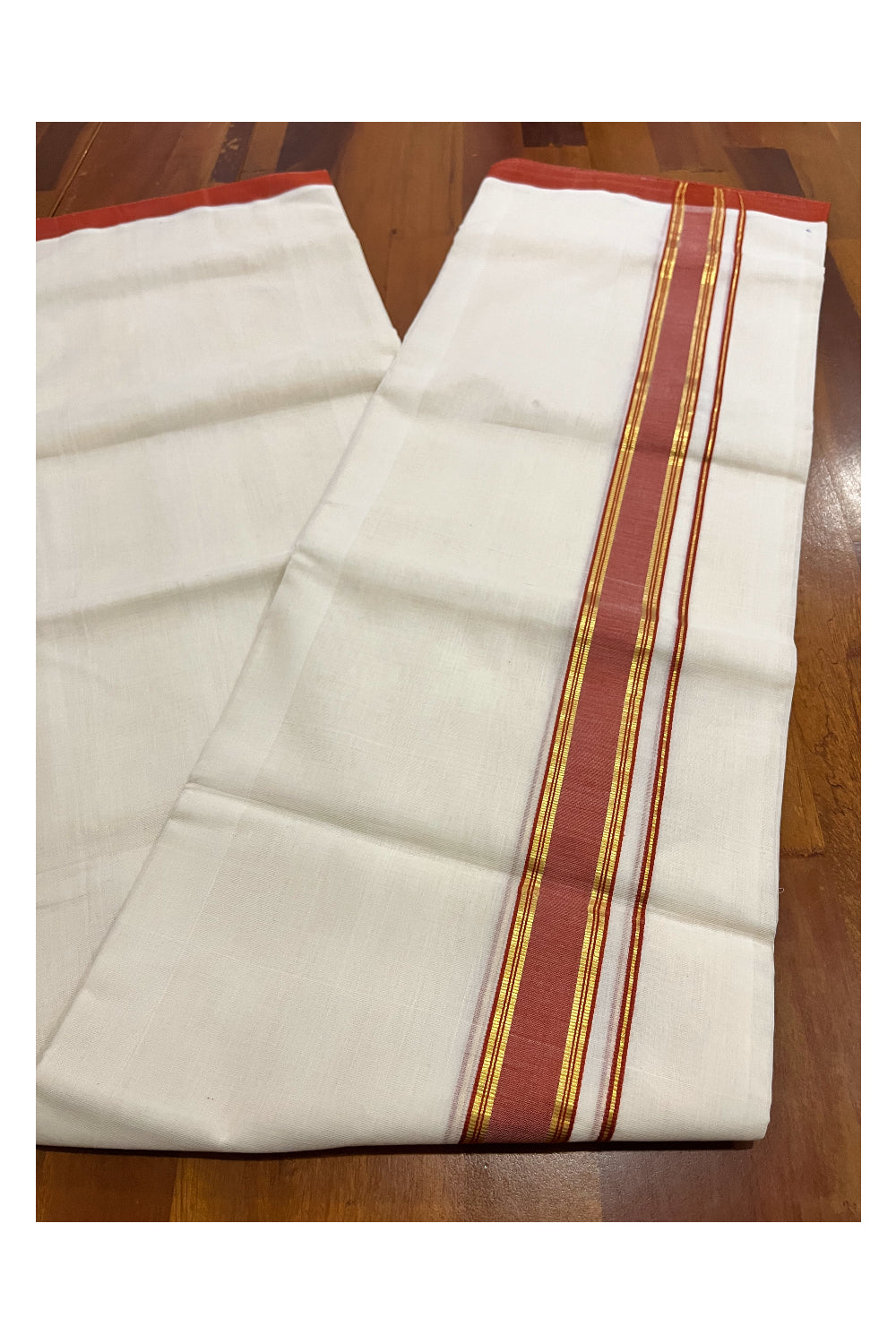 Southloom Premium Balaramapuram Unakkupaavu Handloom Kasavu Mundu with Orange Border (South Indian Kerala Dhoti)