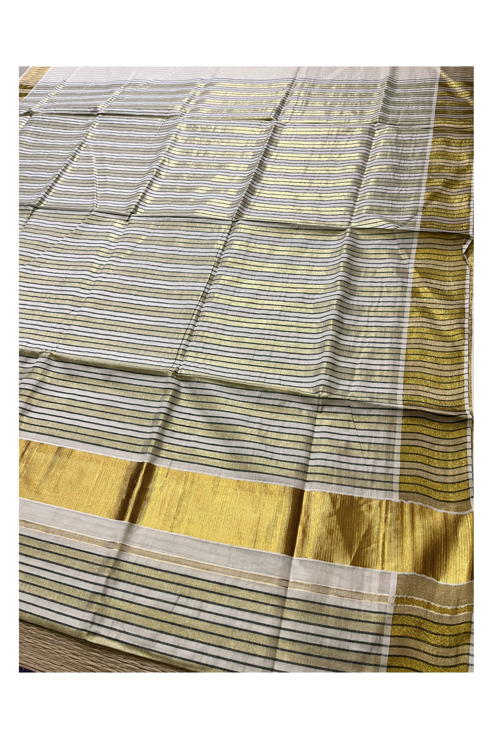 Pure Cotton Kerala Kasavu Saree with Lines Designs on Body and Dark Green Lines on Munthani
