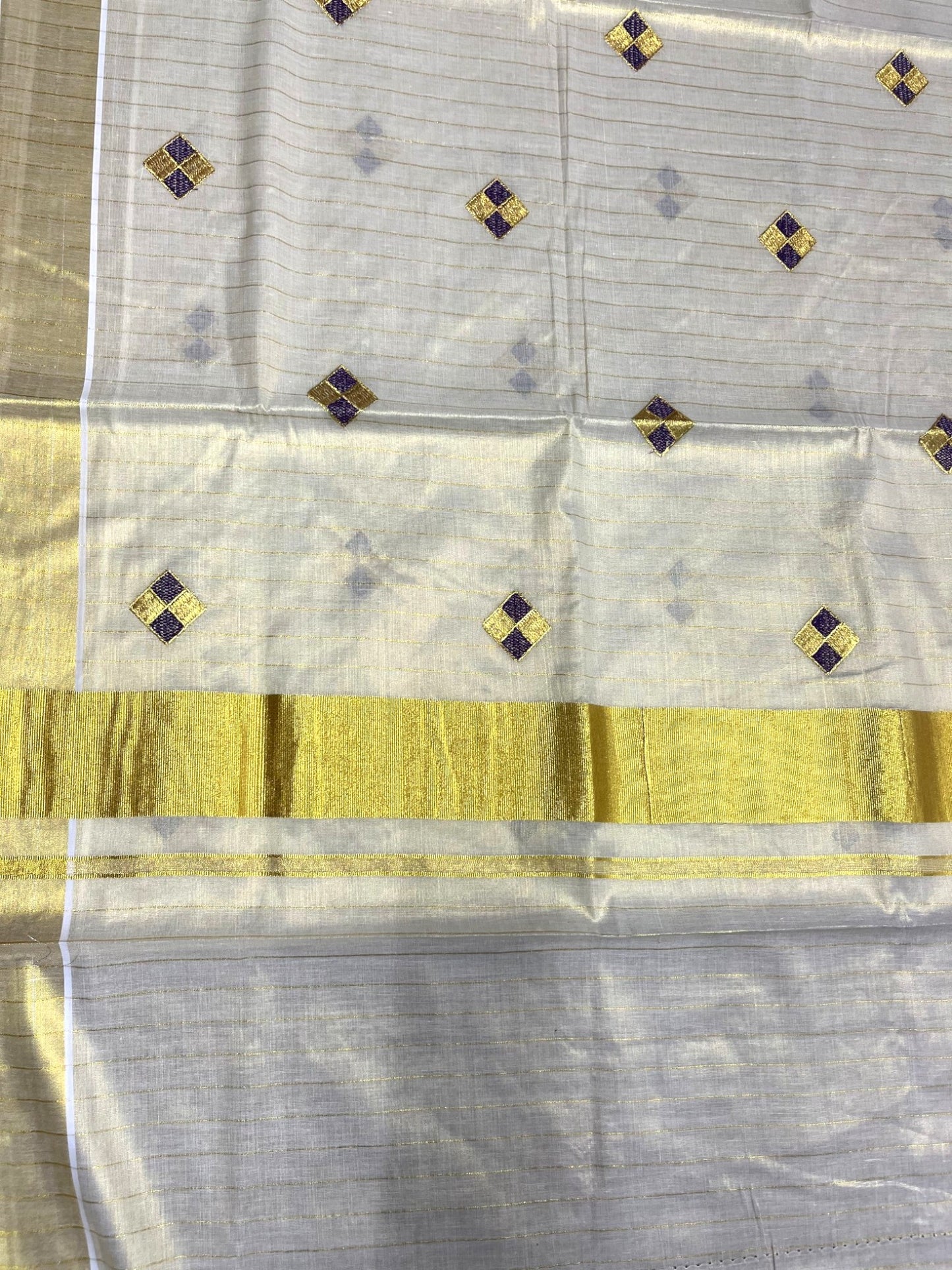 Southloom Kerala Tissue Kasavu Striped Saree with  Diagonal Woven Designs in Purple And Gold Body Work