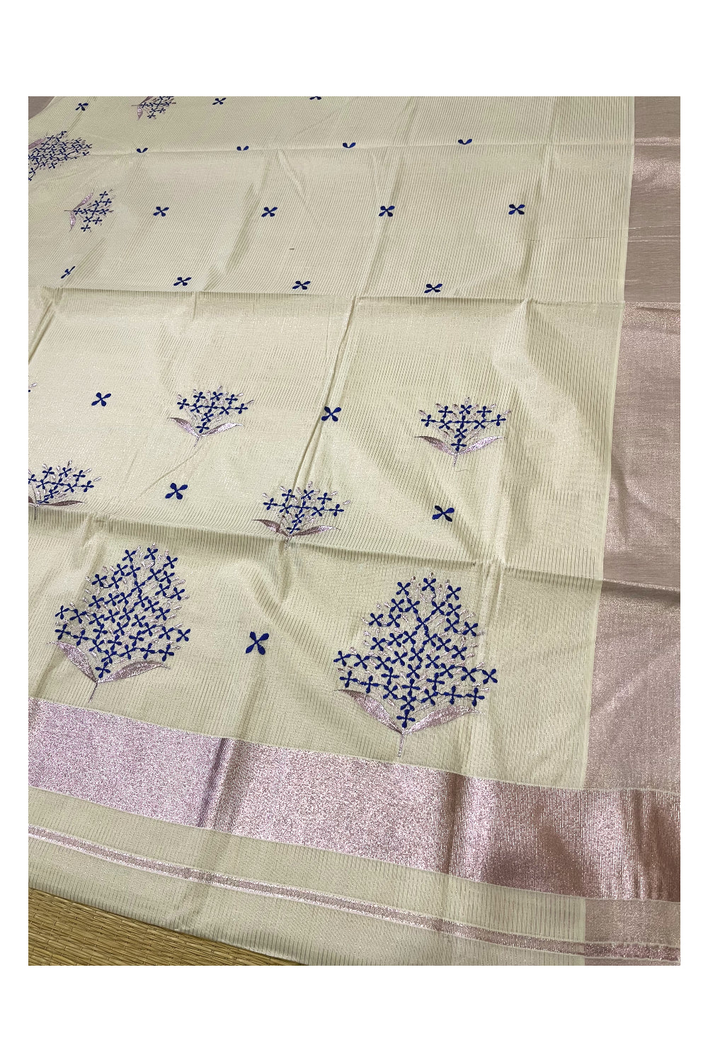 Kerala Cotton Rose Copper Kasavu Micro Lines Saree with Blue Floral Embroidered Designs