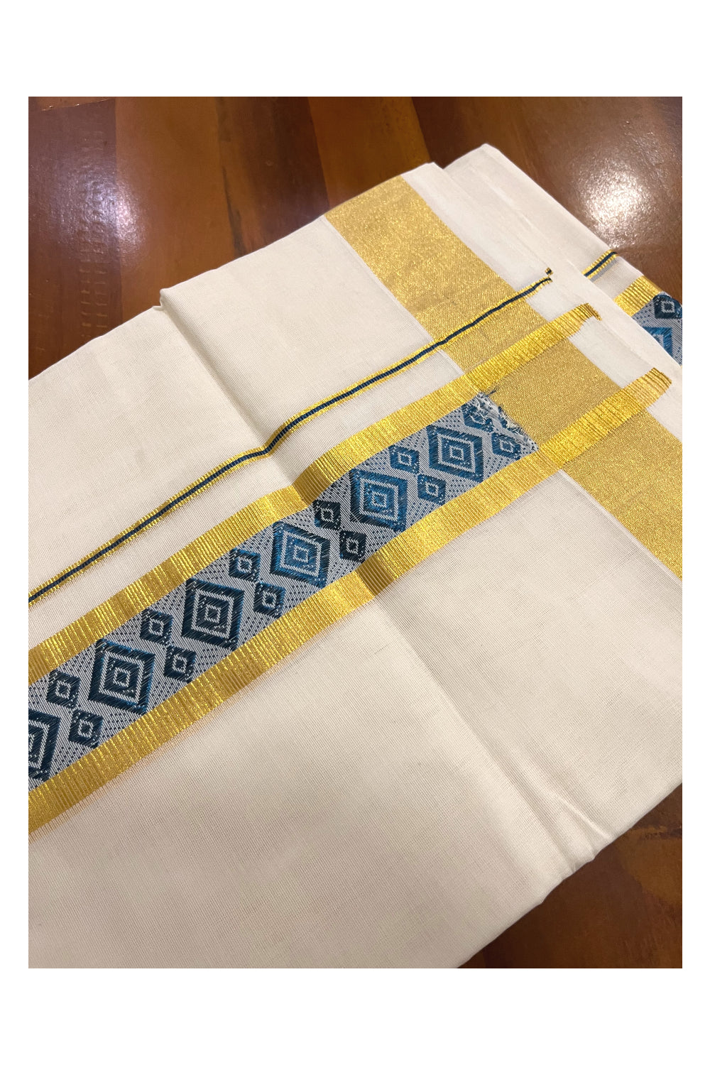 Southloom Premium Handloom Pure Cotton Mundu with Golden and Blue Kasavu Woven Border (Onam Mundu 2023)