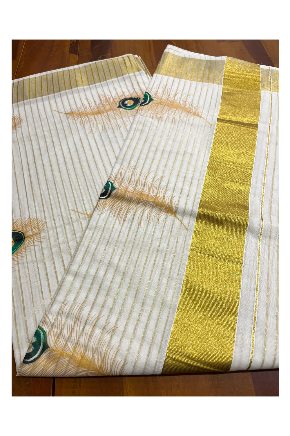 Pure Cotton Kerala Saree with Kasavu Lines and Feather Block Prints Across Body