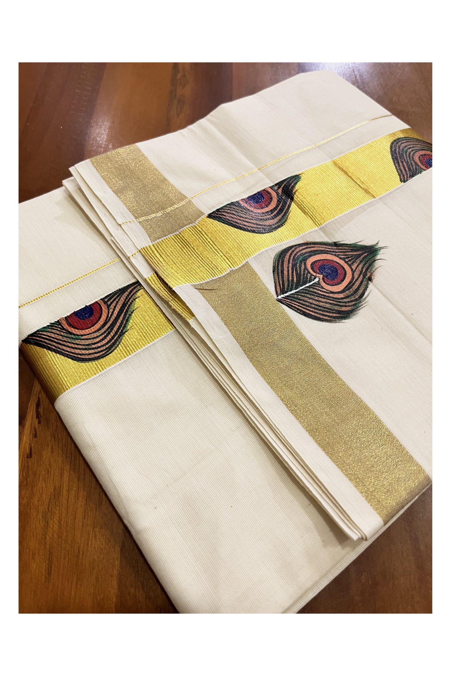 Off White Kerala Cotton Double Mundu with Feather Hand Painted Designs on Kasavu Border (Vishu 2024 Collection)