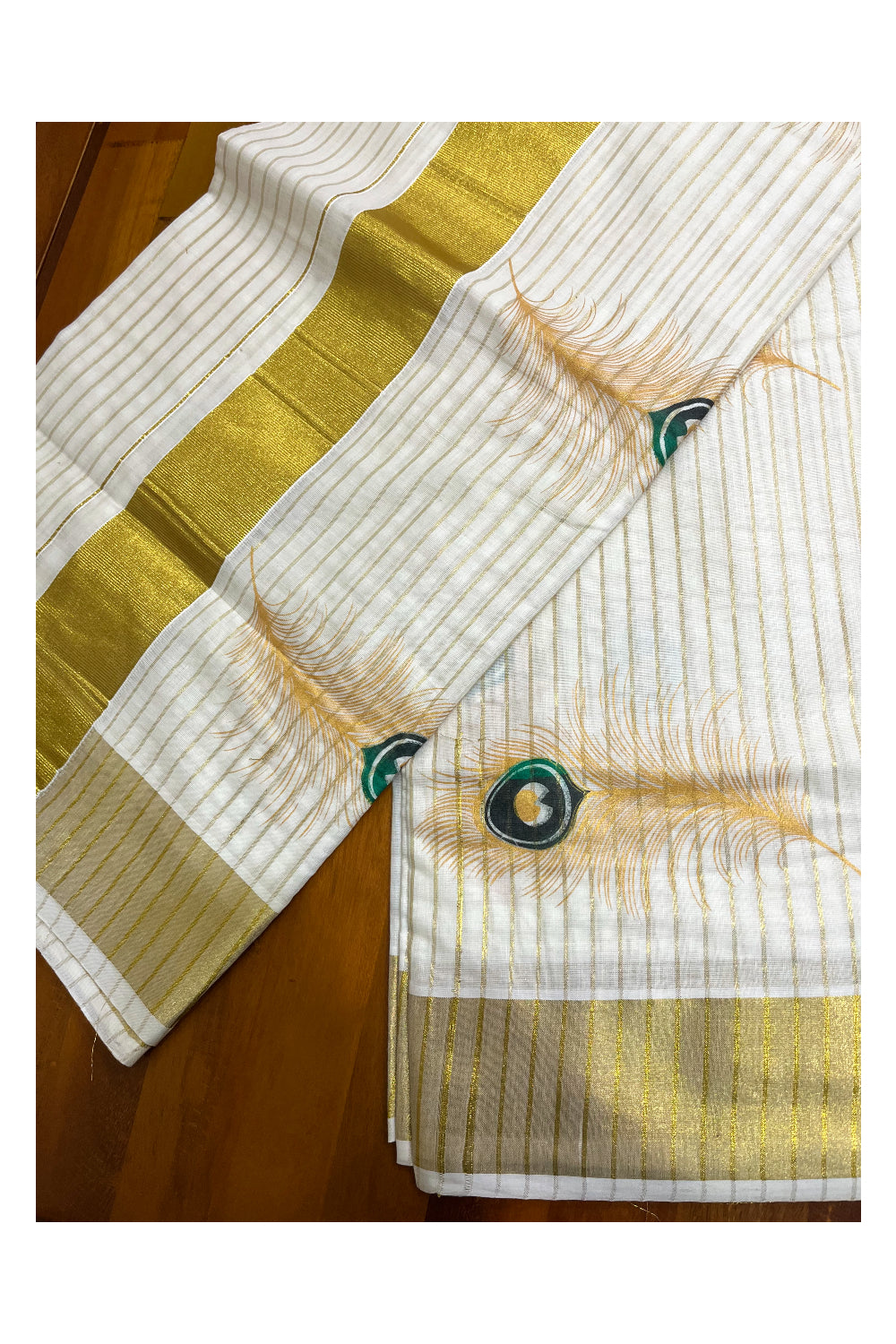 Pure Cotton Kerala Saree with Kasavu Lines and Feather Block Prints Across Body