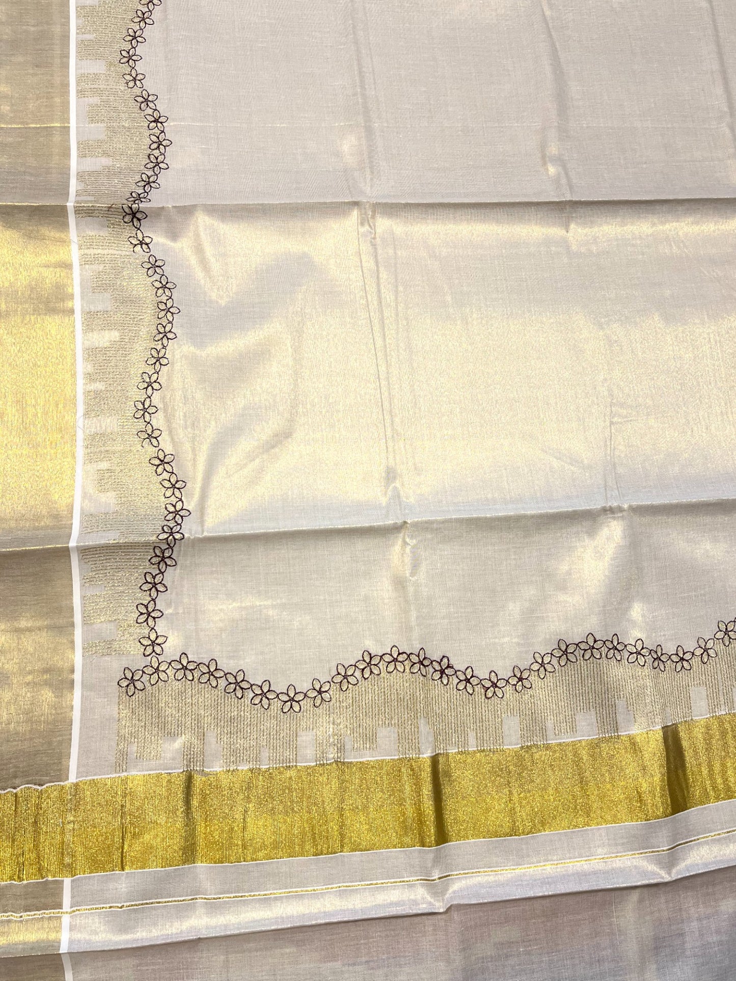 Southloom Tissue Kerala Kasavu Saree with Floral Embroidery Design