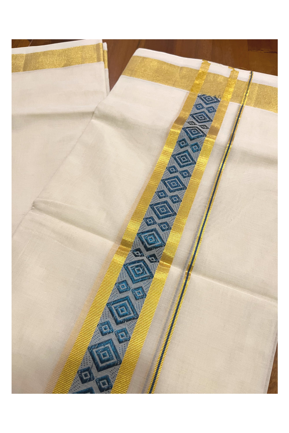 Southloom Premium Handloom Pure Cotton Mundu with Golden and Blue Kasavu Woven Border (Onam Mundu 2023)