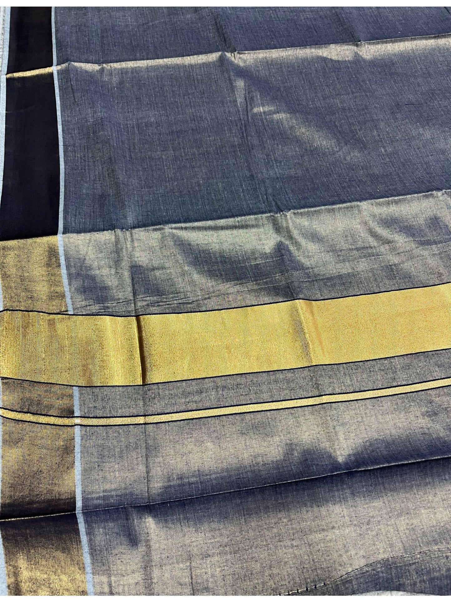 Southloom Kerala Tissue Blue Plain Saree With Golden Border