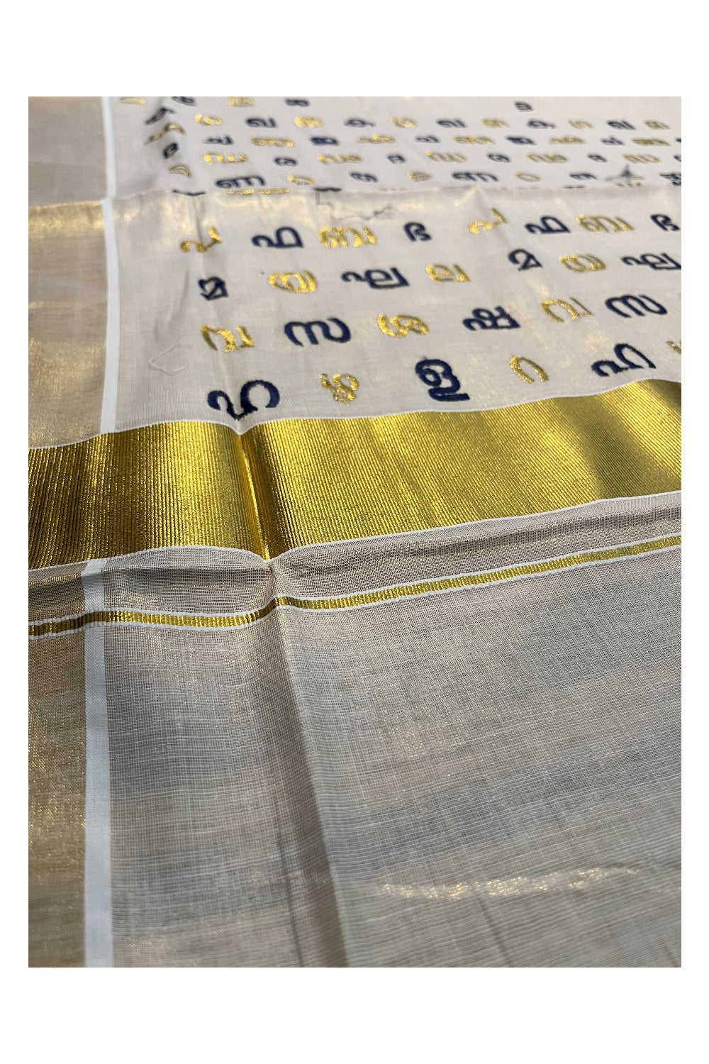 Southloom Kerala Tissue Kasavu Saree with Blue and Gold Malayalam Aksharamala Embroidery Work on Body