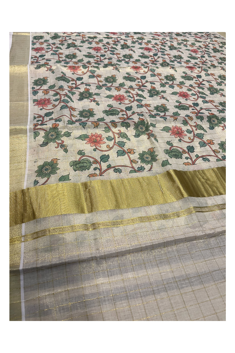 Kerala Tissue Kasavu Check Saree with Green Floral Kalamkari Design