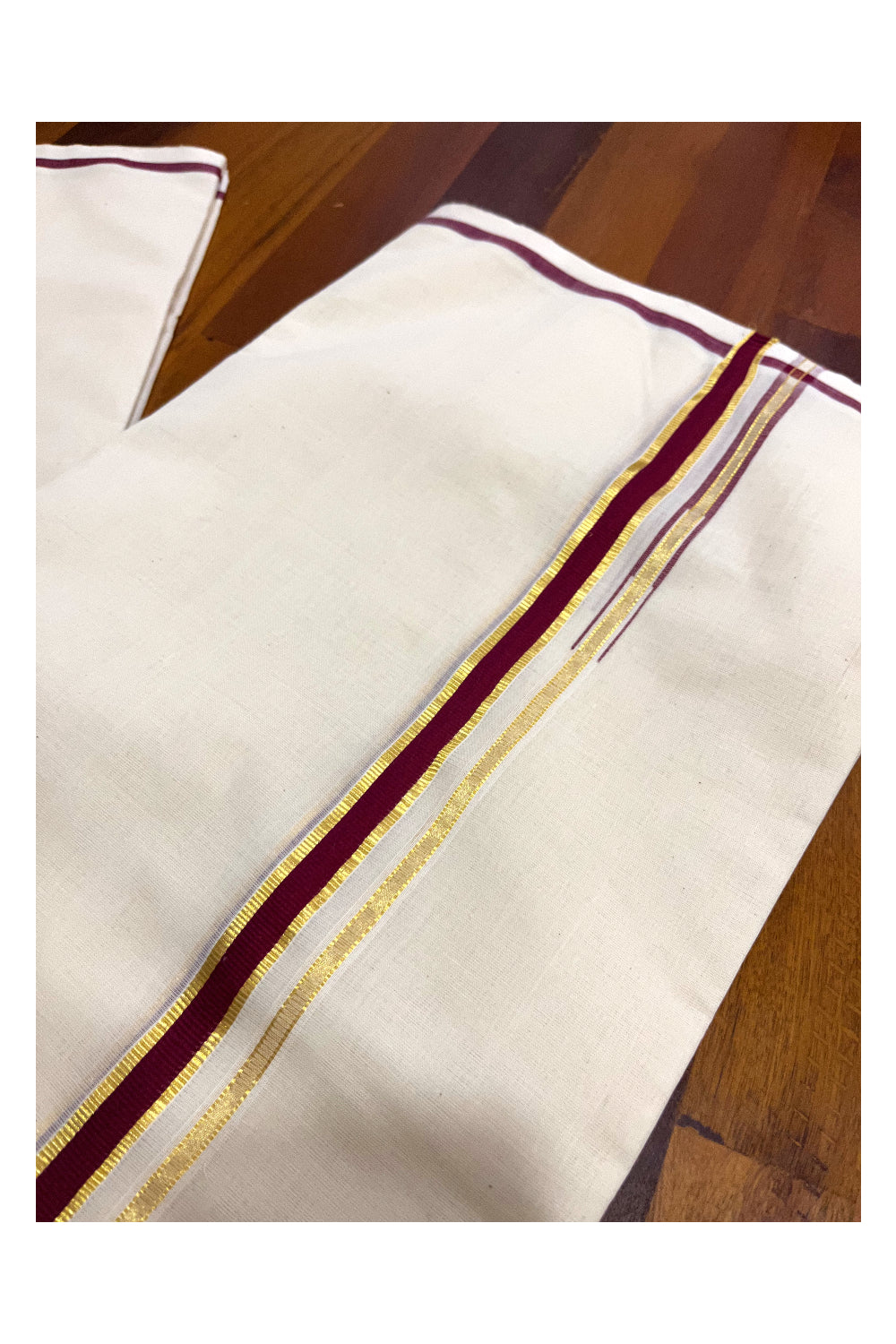 Southloom Premium Handloom Pure Cotton Mundu with Maroon Puliyilakkara Kasavu Border (Onam Mundu 2023)