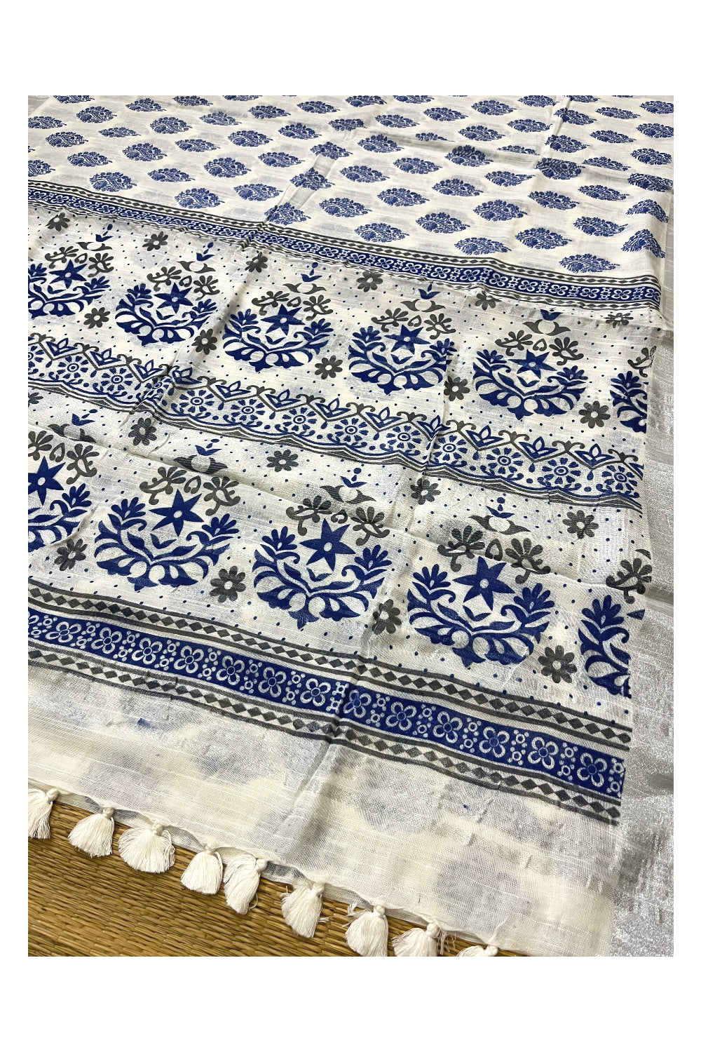 Southloom Linen White Saree with Blue Designer Prints and Tassels works on Pallu