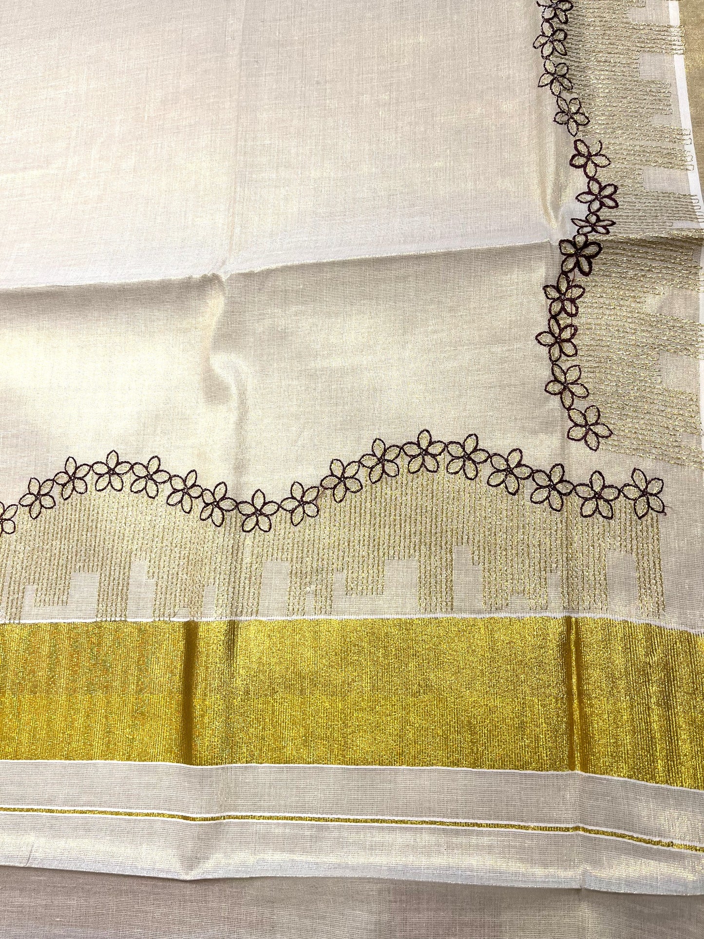 Southloom Tissue Kerala Kasavu Saree with Floral Embroidery Design