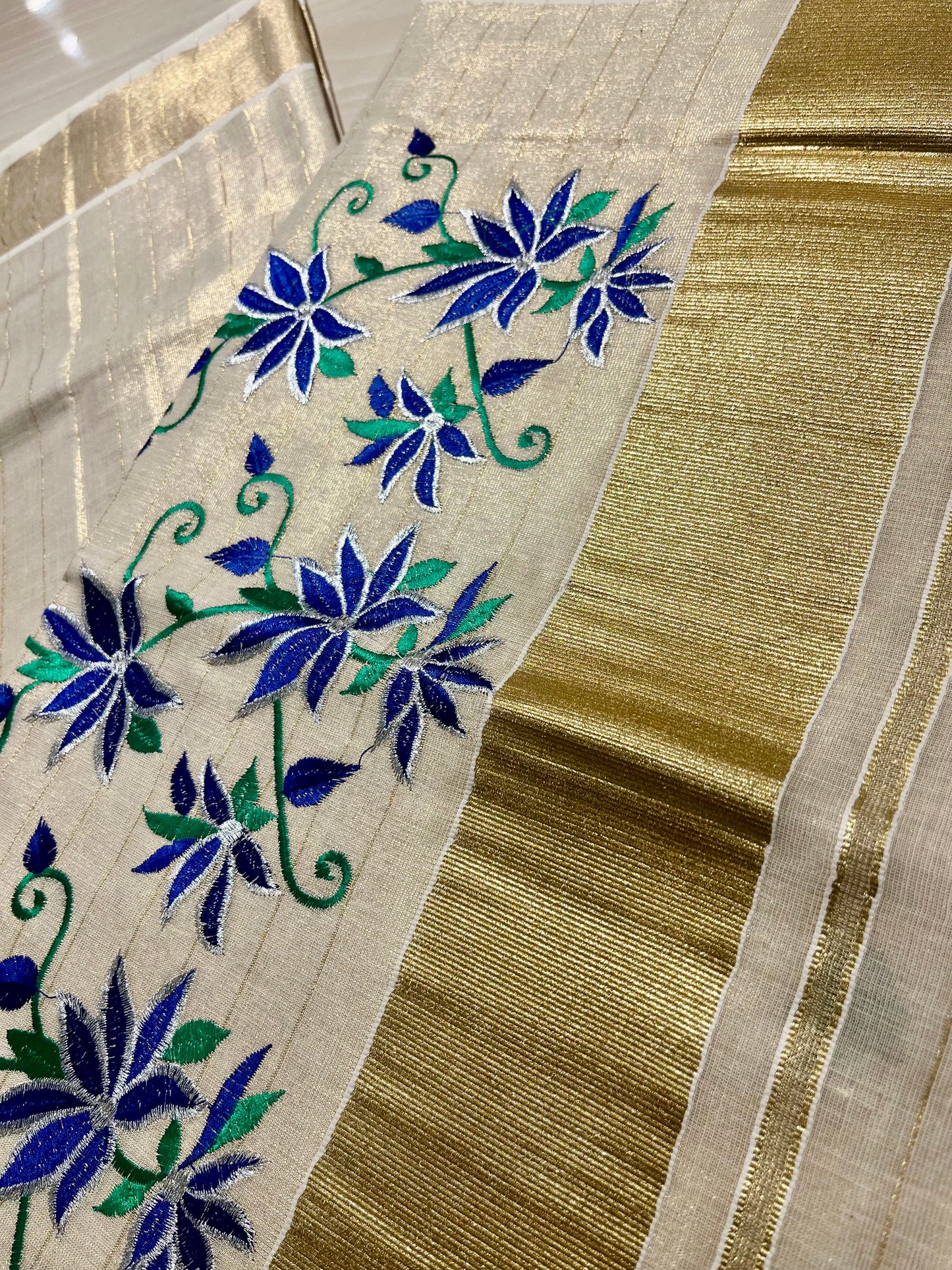 Kerala Tissue Saree With Blue Floral Embroidery SL143