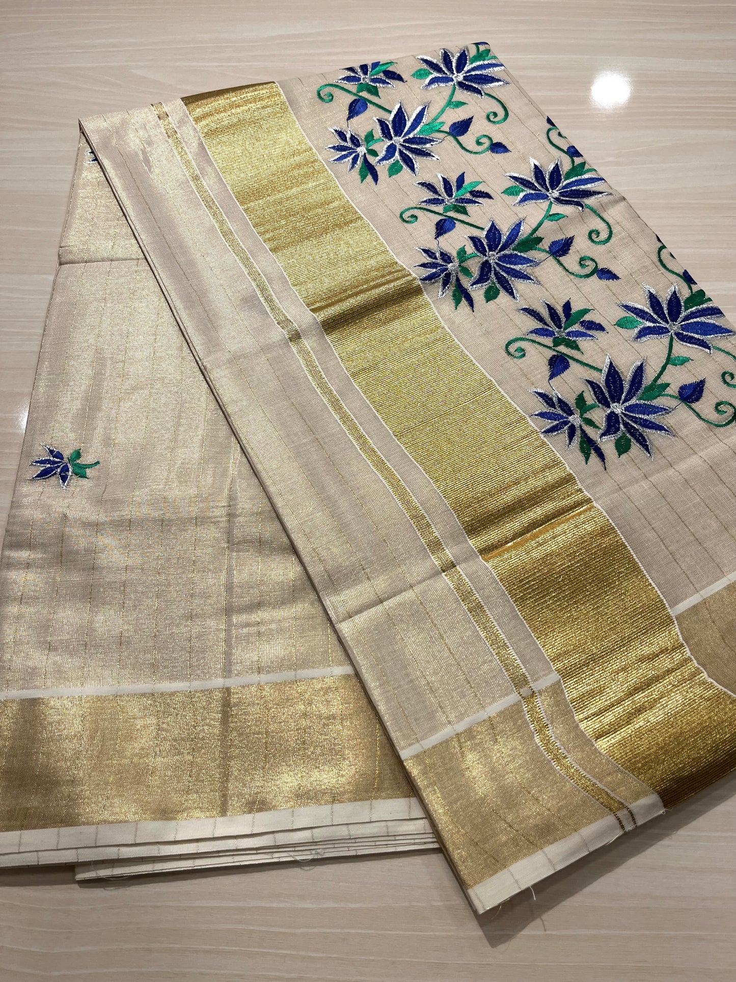 Kerala Tissue Saree With Blue Floral Embroidery SL143