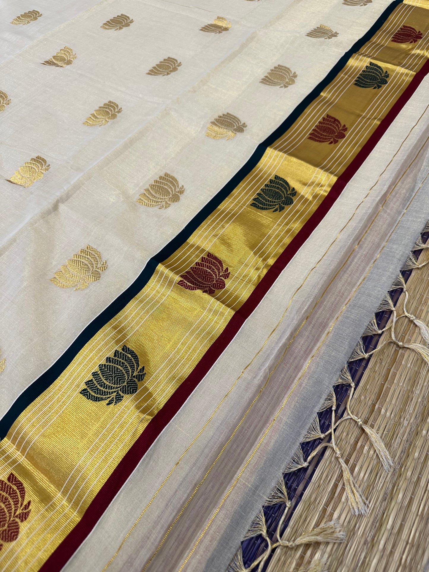 Southloom Premium Handloom Tissue Kasavu Saree with Green, Gold and Maroon Lotus Woven Designs