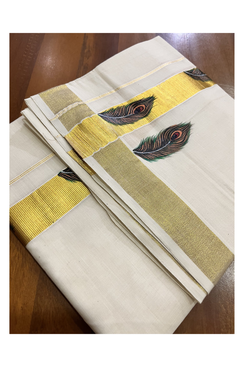 Off White Kerala Cotton Double Mundu with Feather Hand Painted Designs on Kasavu Border (Vishu 2024 Collection)