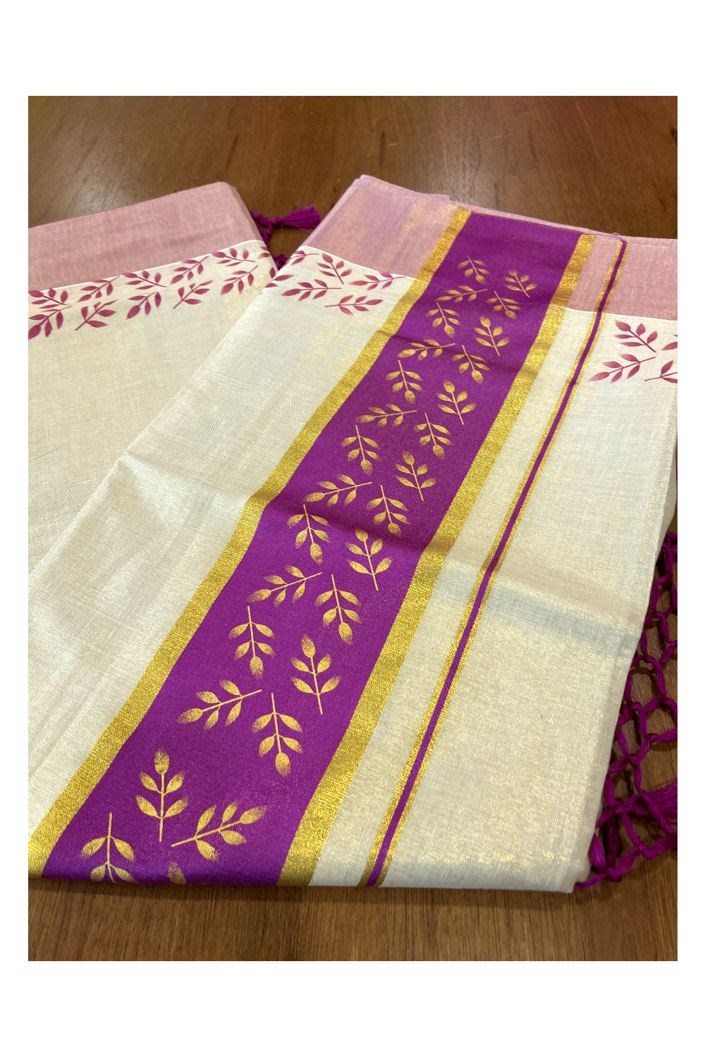 Kerala Tissue Kasavu Saree with Golden and Magenta Block Prints on Border and Tassels Works