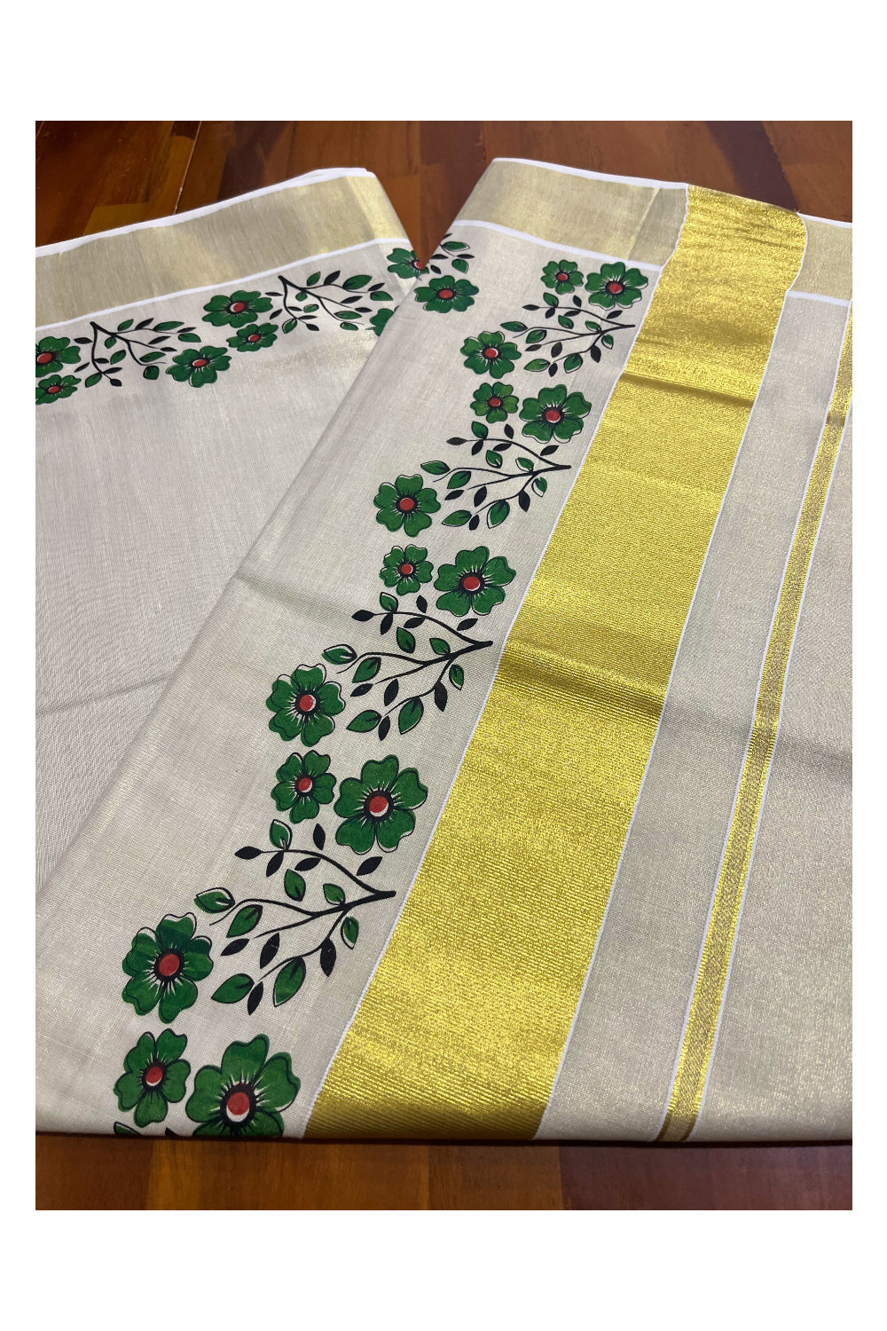 Kerala Tissue Kasavu Saree with Green Floral Block Printed Designs