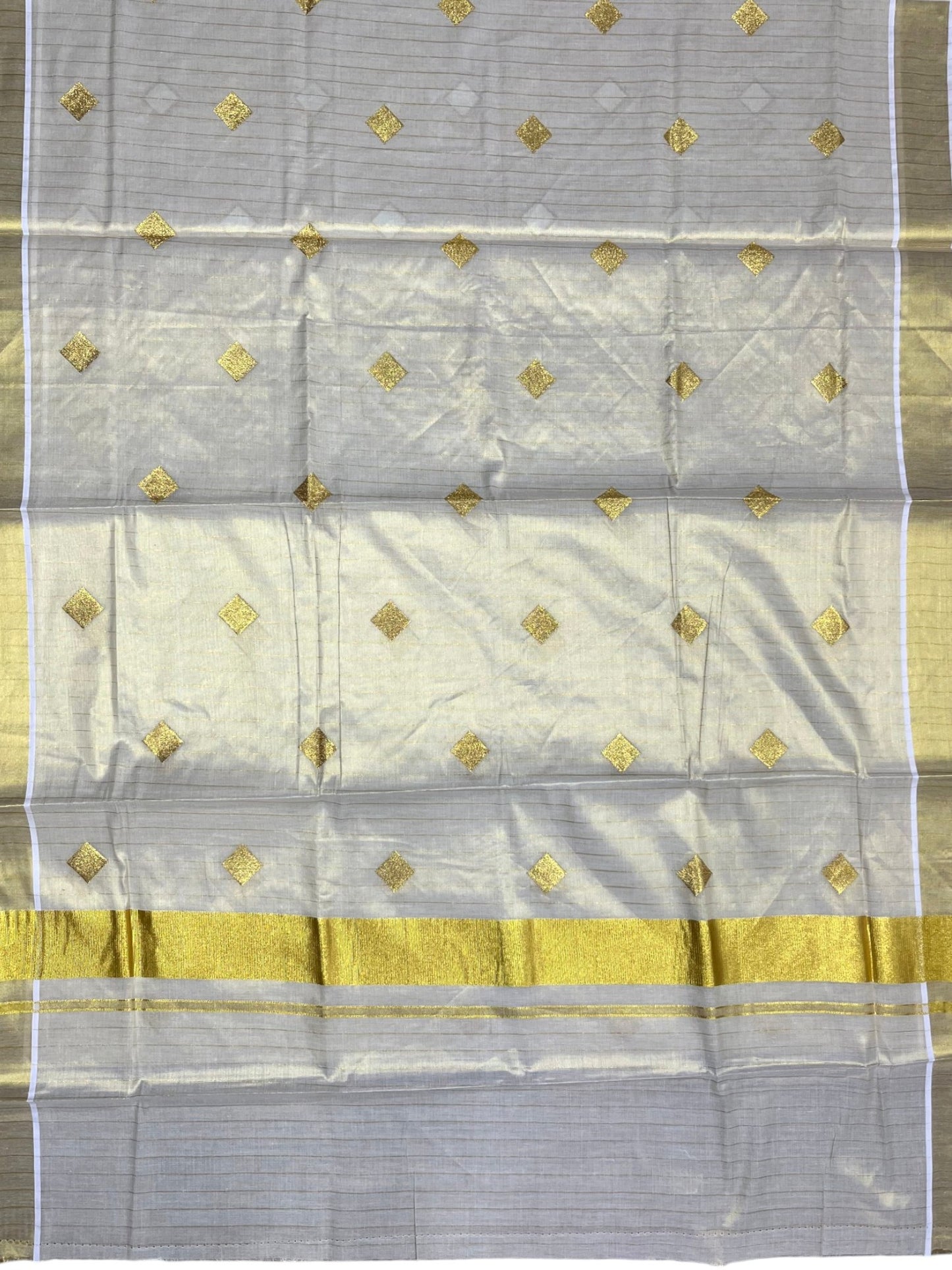 Southloom Kerala Tissue Kasavu Striped Saree with  Diagonal Woven Designs in Golden Body Work