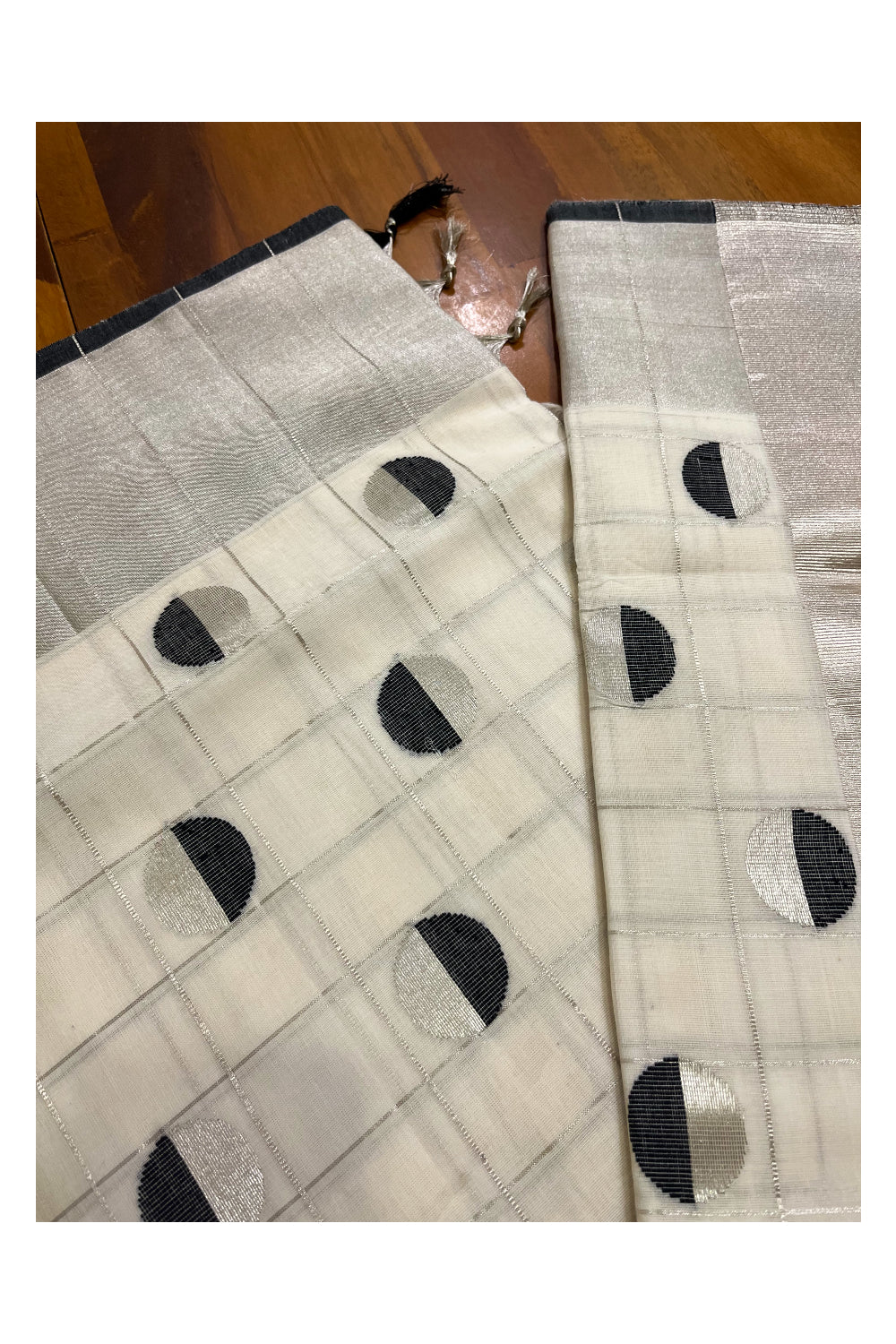 Southloom Premium Handloom Check Design Kerala Saree with Silver Kasavu and Black Semi Polka Woven Motifs