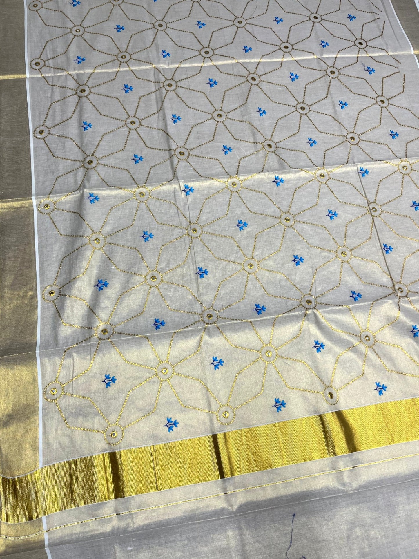 Southloom Kerala Tissue Kasavu Saree with Floral Embroidery Work on Body in Blue