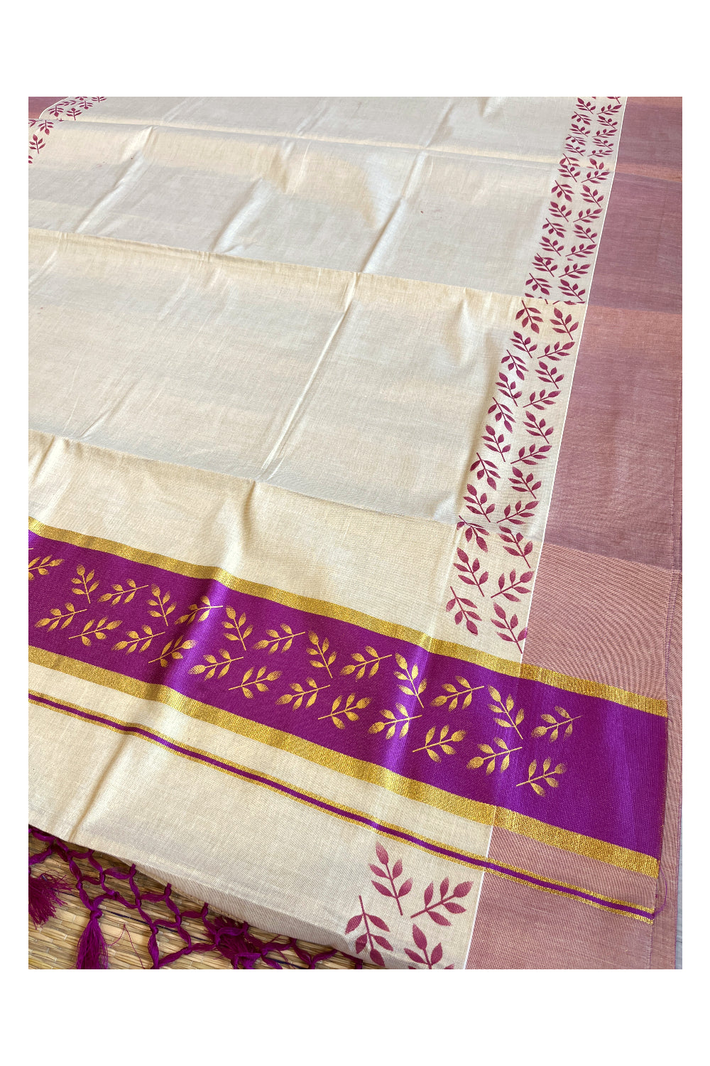 Kerala Tissue Kasavu Saree with Golden and Magenta Block Prints on Border and Tassels Works