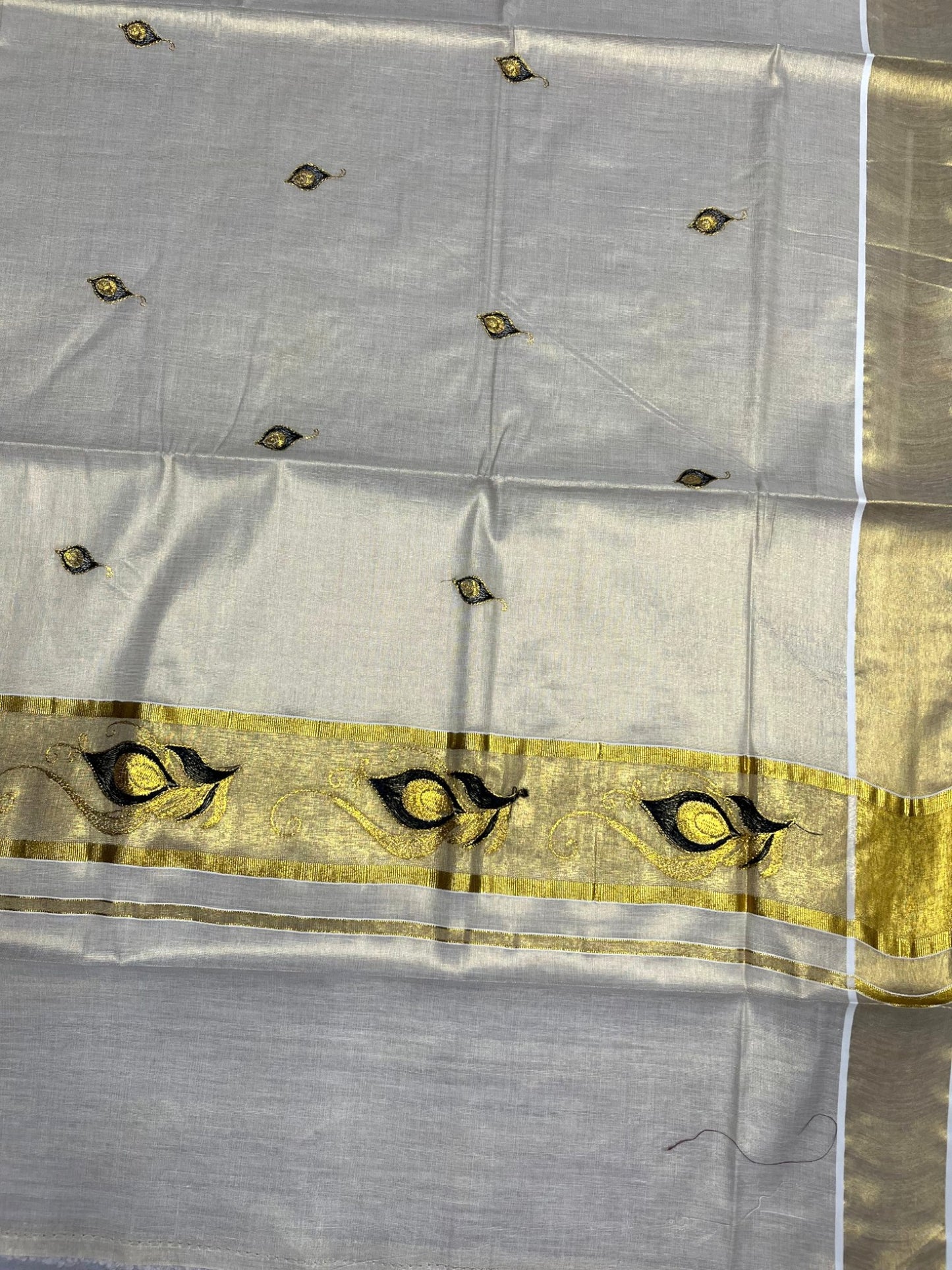 Southloom Kerala Tissue Kasavu Saree with Black Peacock Feather Embroidery Works