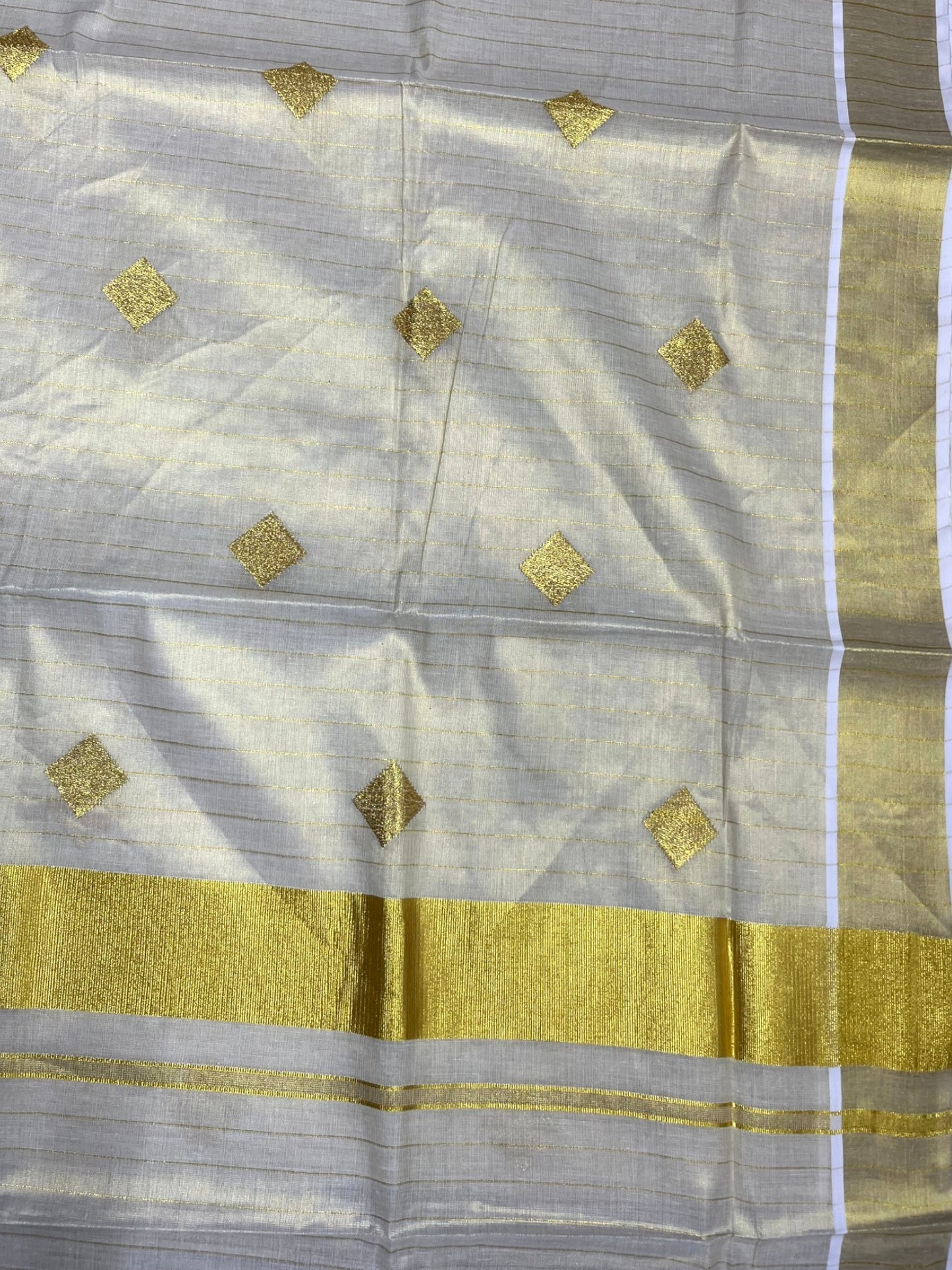 Southloom Kerala Tissue Kasavu Striped Saree with  Diagonal Woven Designs in Golden Body Work