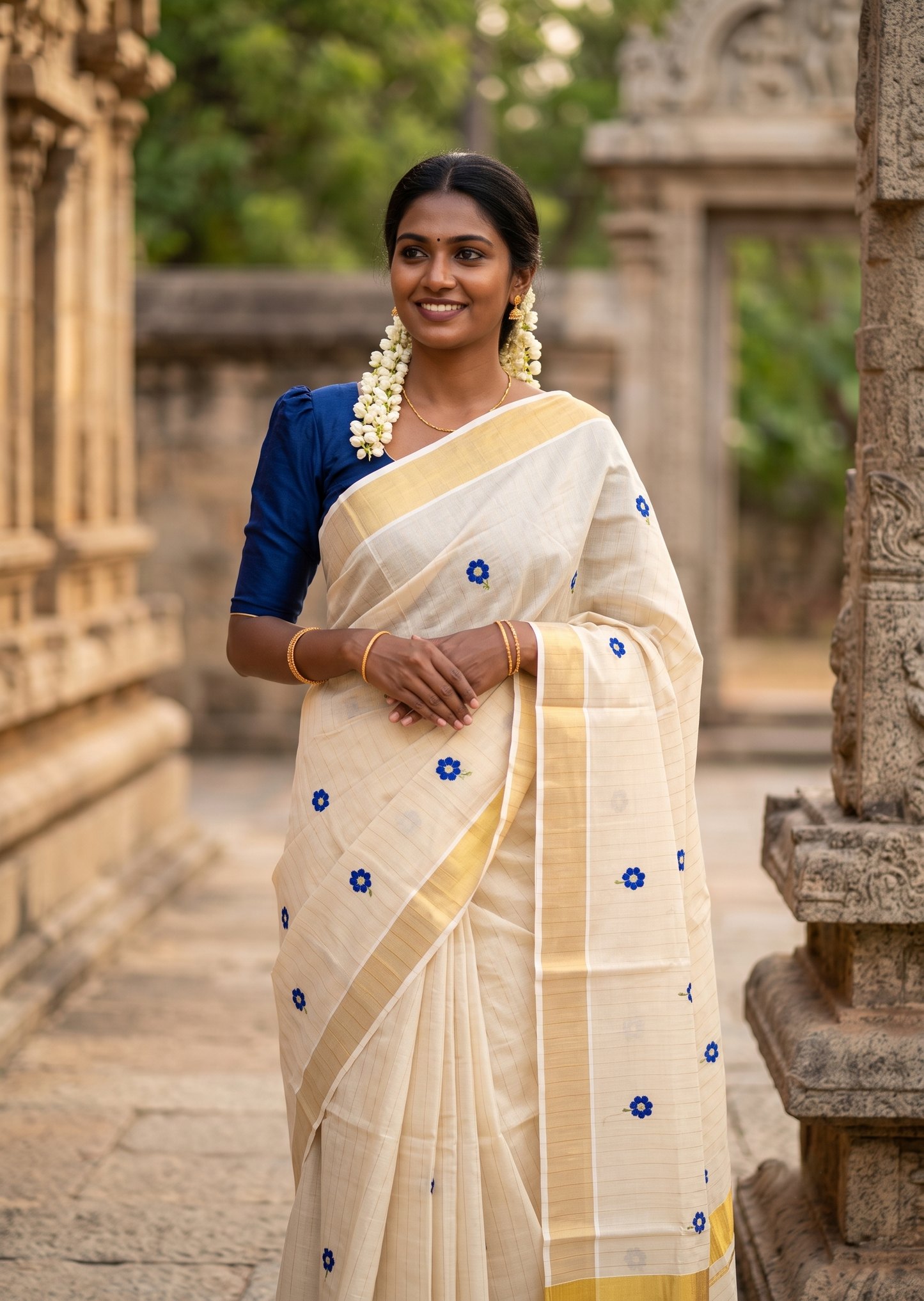 Southloom Kerala Tissue Blue Floral Embroidery Design on the Body With Gold Kasavu