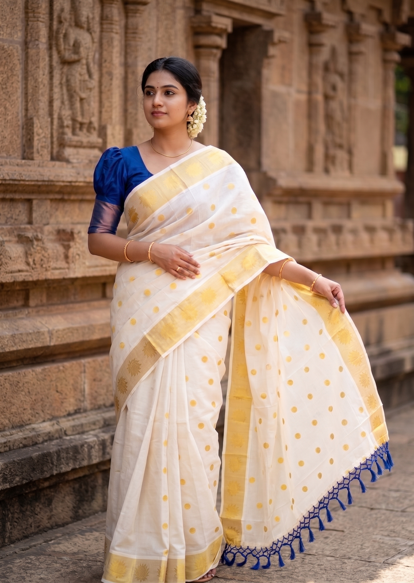 Southloom Kerala Cotton Kasavu Saree with Polka Woven Works on Body and Lotus Border with Blue Tassels SL513