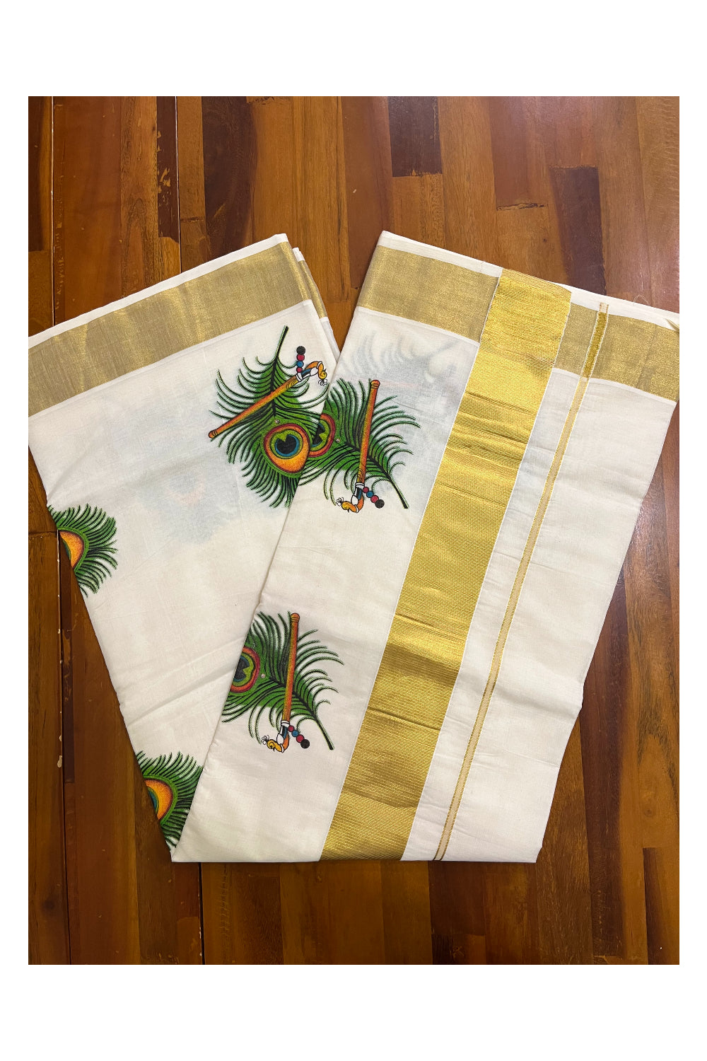 Pure Cotton Kerala Kasavu Saree with Feather and Flute Mural Prints on Border