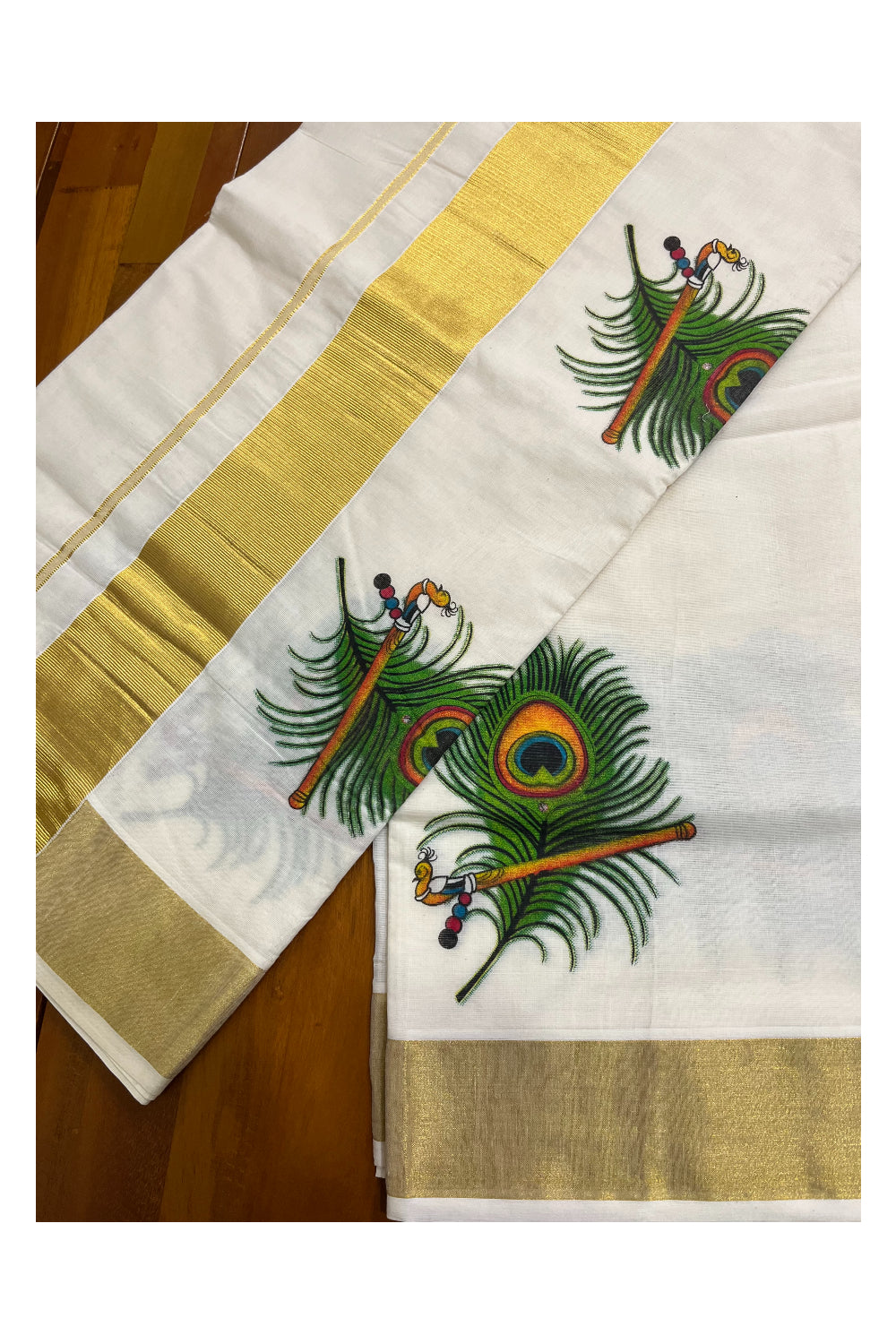 Pure Cotton Kerala Kasavu Saree with Feather and Flute Mural Prints on Border