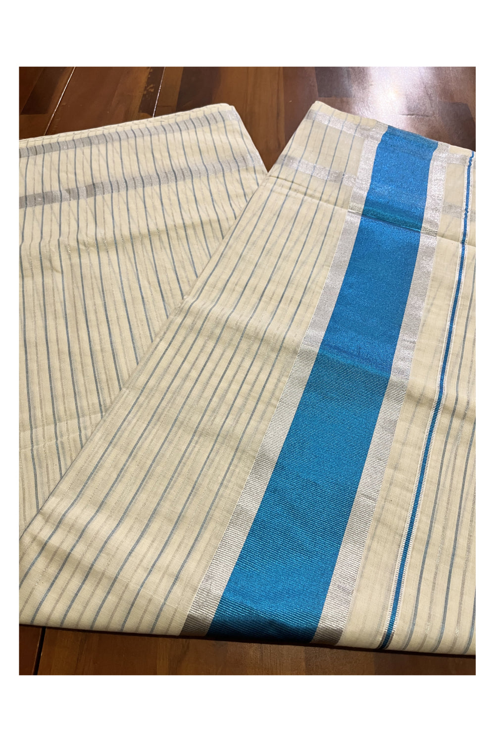 Pure Cotton Kerala Saree with Silver and Blue Kasavu Lines Across Body