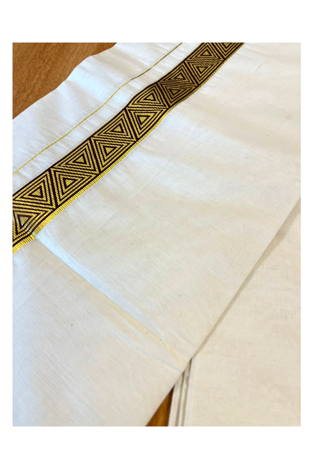 Southloom Kasavu Double Mundu with Brown Prints Along Kasavu Kara