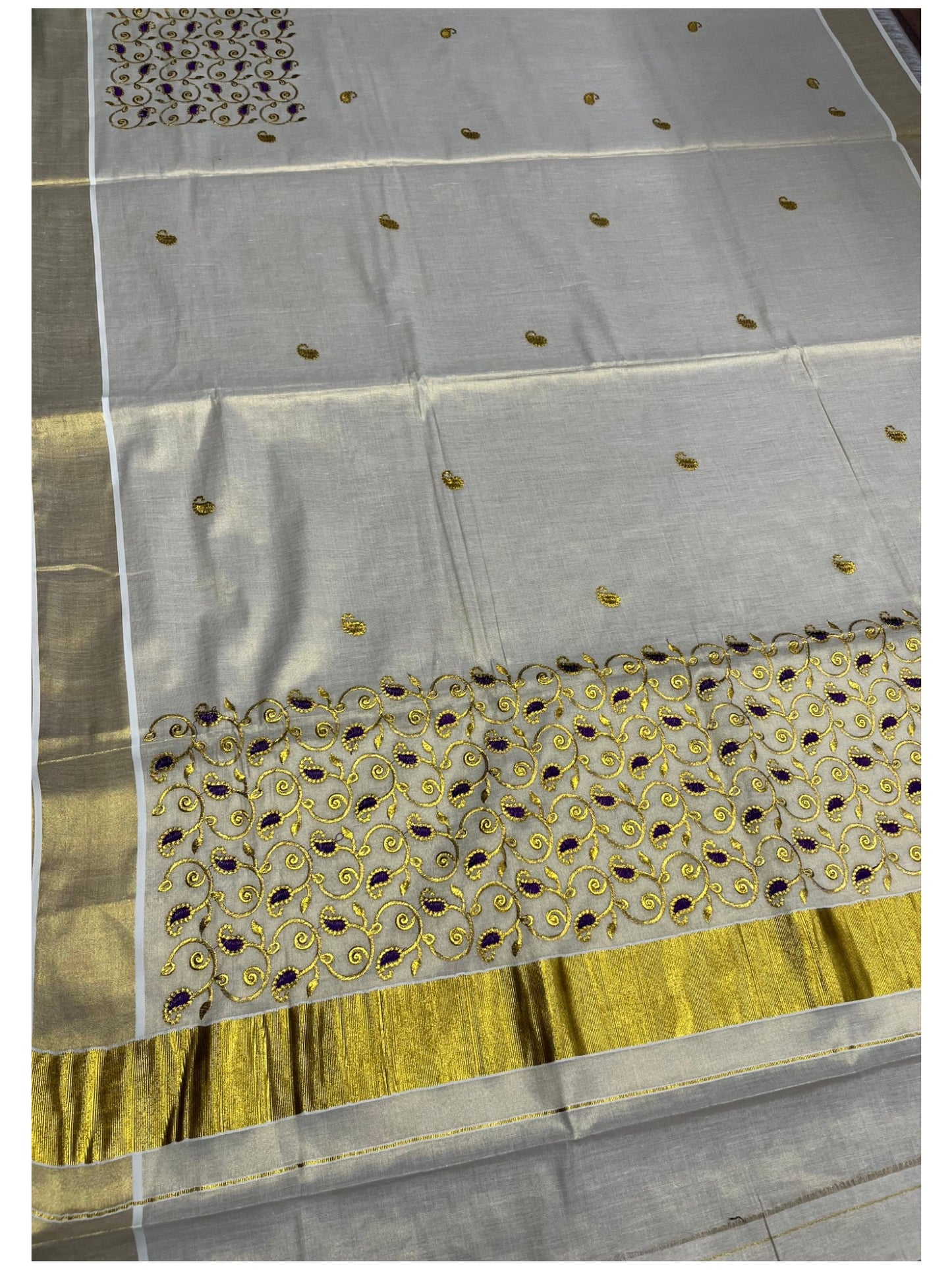 Southloom Tissue Kerala Kasavu Plain Saree with Purple &Gold Embroidery Designs on Body