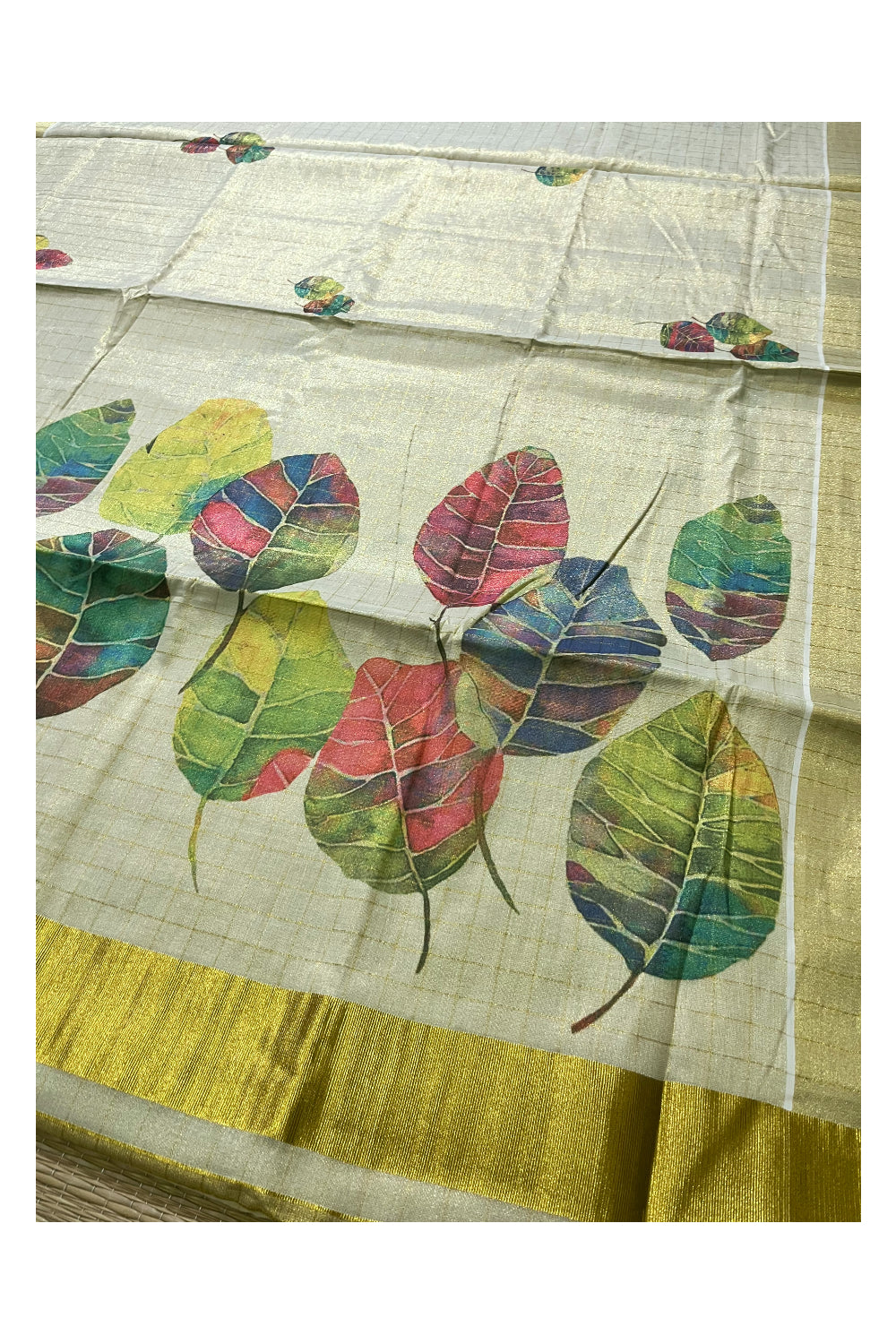 Kerala Tissue Kasavu Check Design Saree with Leaf Mural Prints on Body