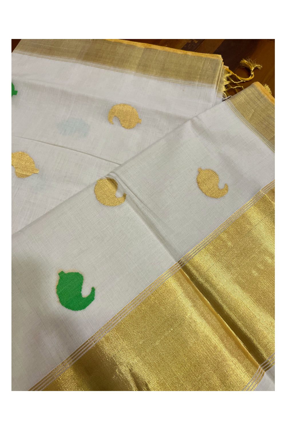 Southloom Super Premium Balaramapuram Unakkupaavu Handloom Kasavu Saree with and Light Green and Golden Paisley Woven Designs on Border