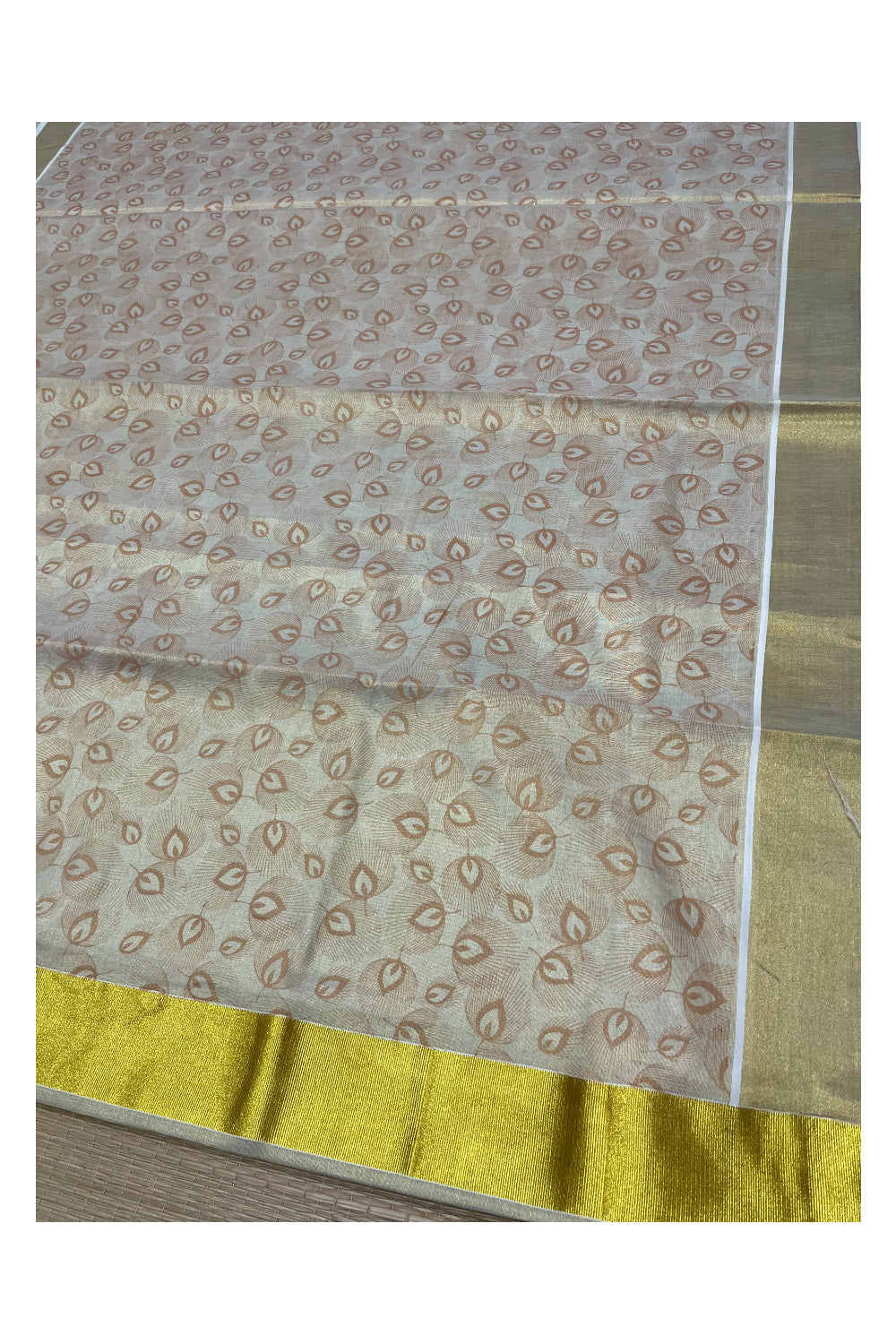 Kerala Tissue Kasavu Saree with Brown Block Printed Designs