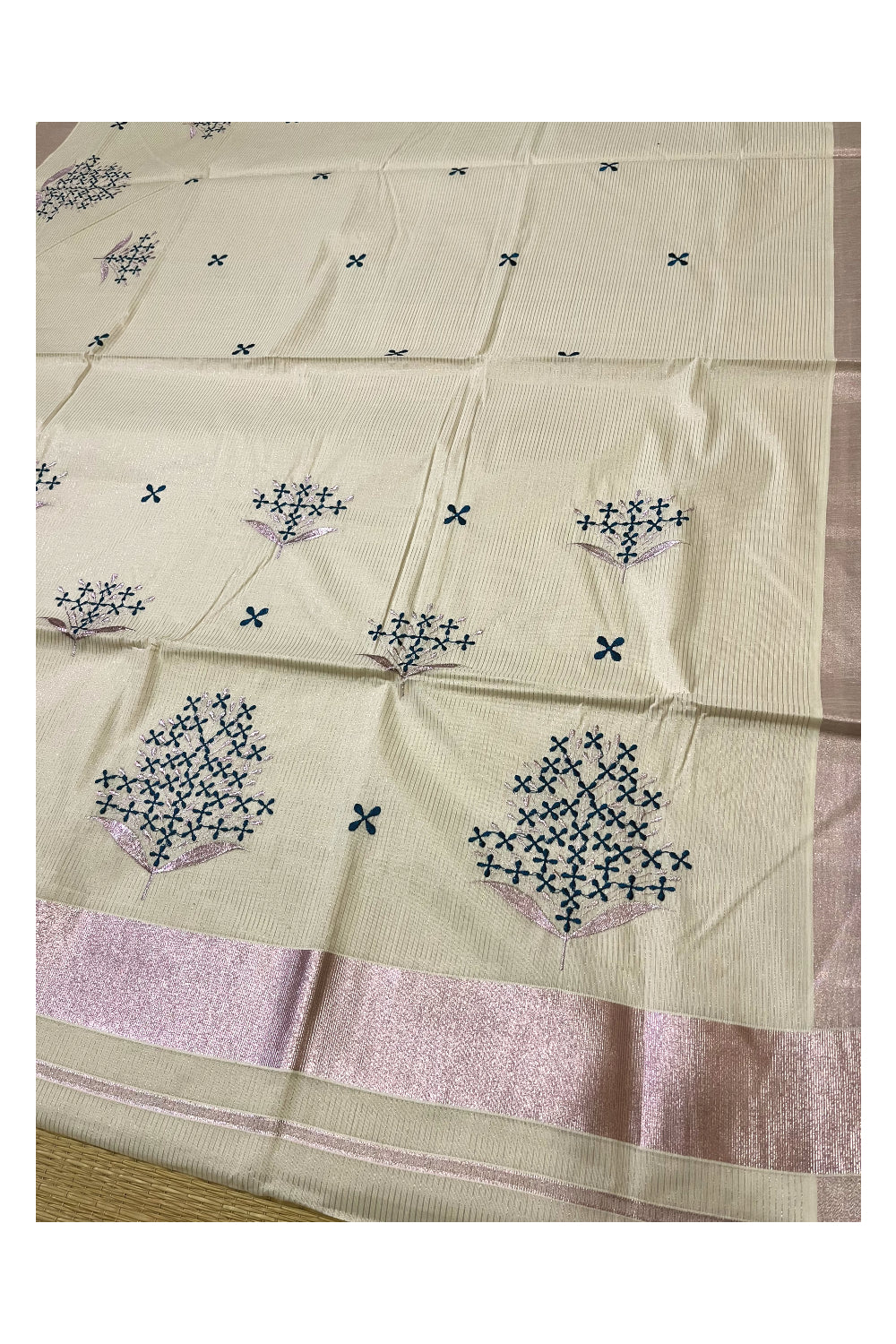 Kerala Cotton Rose Copper Kasavu Micro Lines Saree with Blue Floral Embroidered Designs