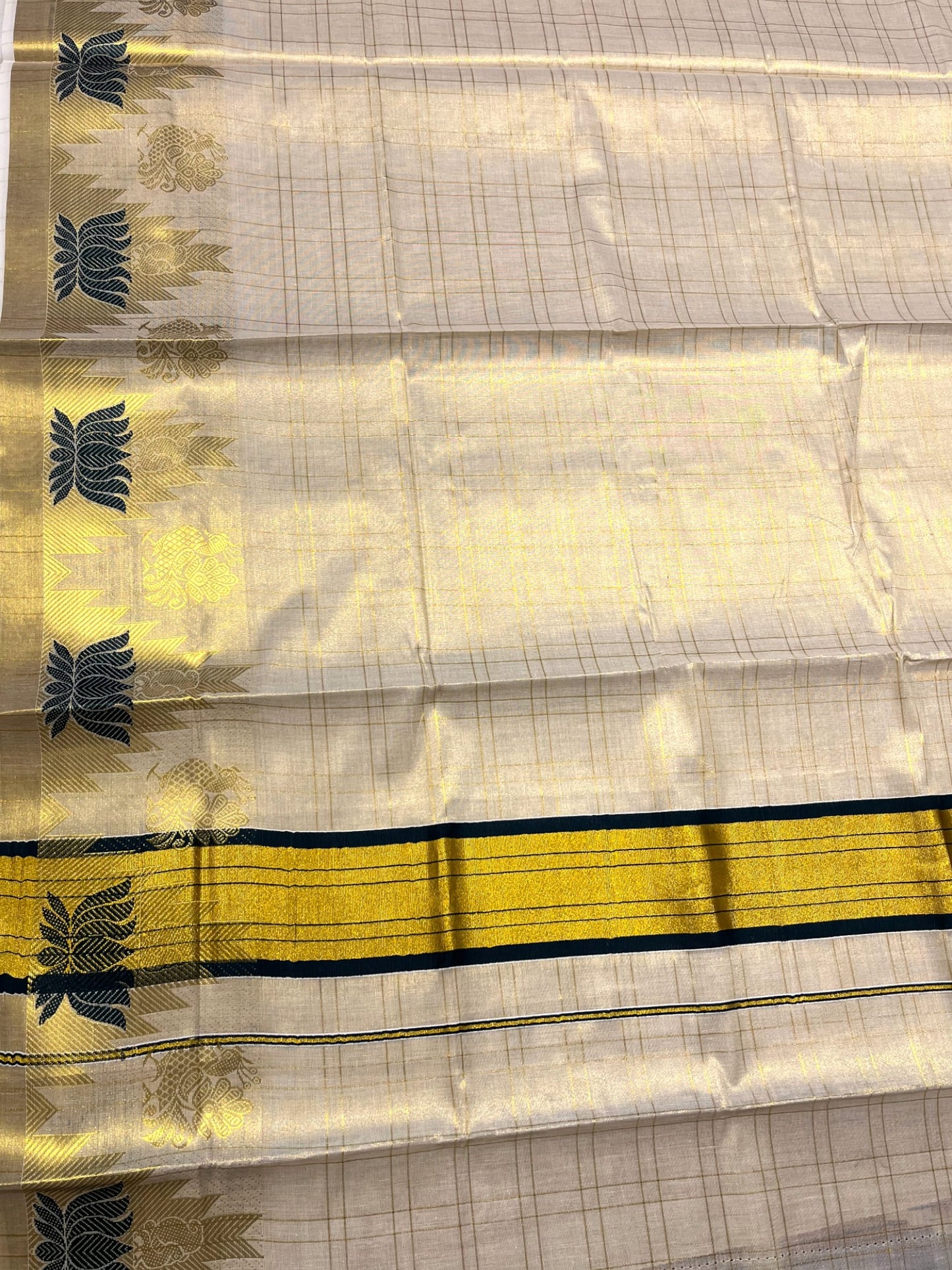 Southloom Tissue Check Kerala Kasavu Saree with Lotus Design And Green Border