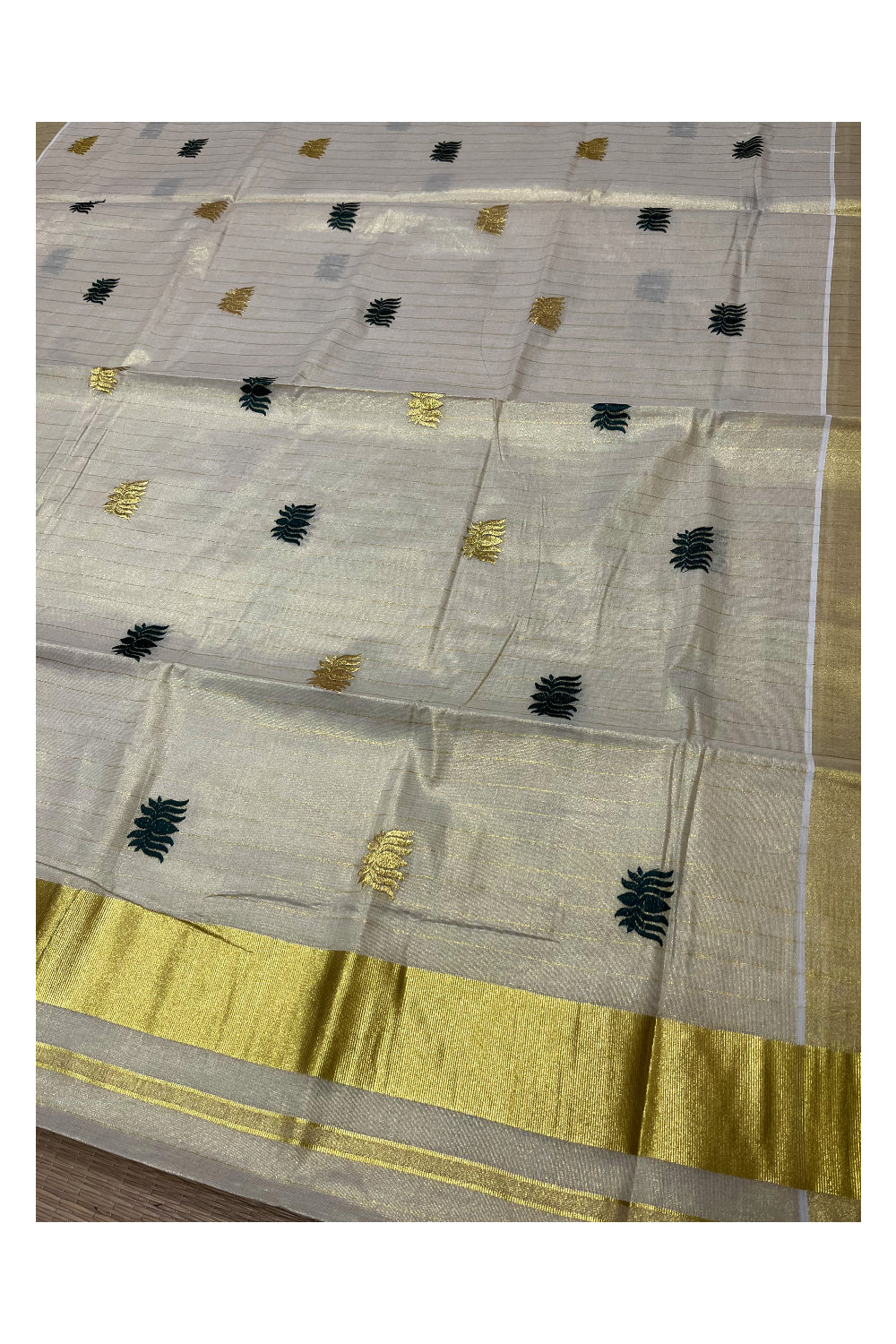 Kerala Tissue Kasavu Striped Saree with Green Lotus Prints on Body and Pallu