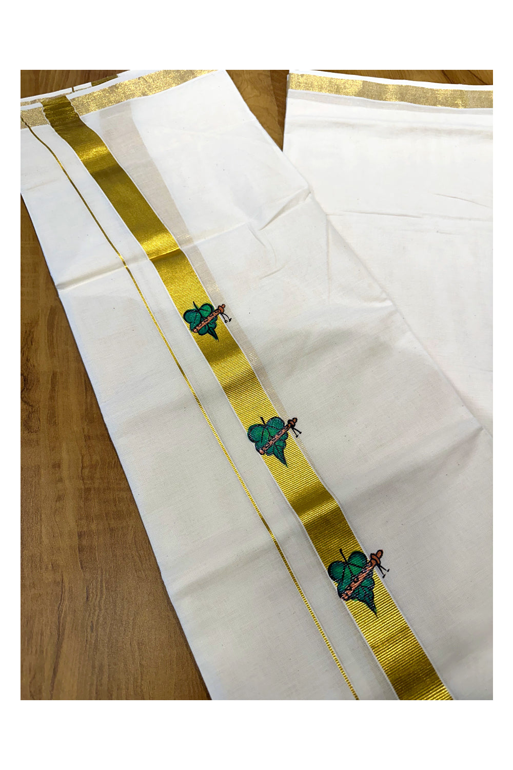 Off White Pure Cotton Double Mundu with Leaf Flute Mural Painted Design on Kasavu Kara (South Indian Dhoti)