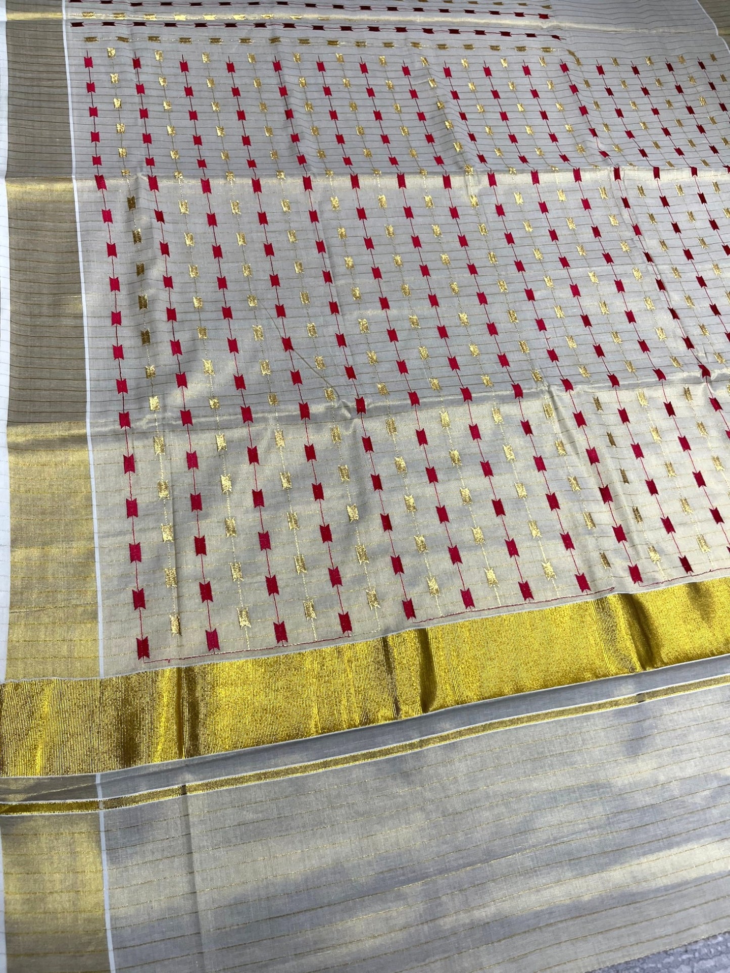 Southloom Tissue Kerala Kasavu Plain Saree with Red &Gold Embroidery Designs on Body