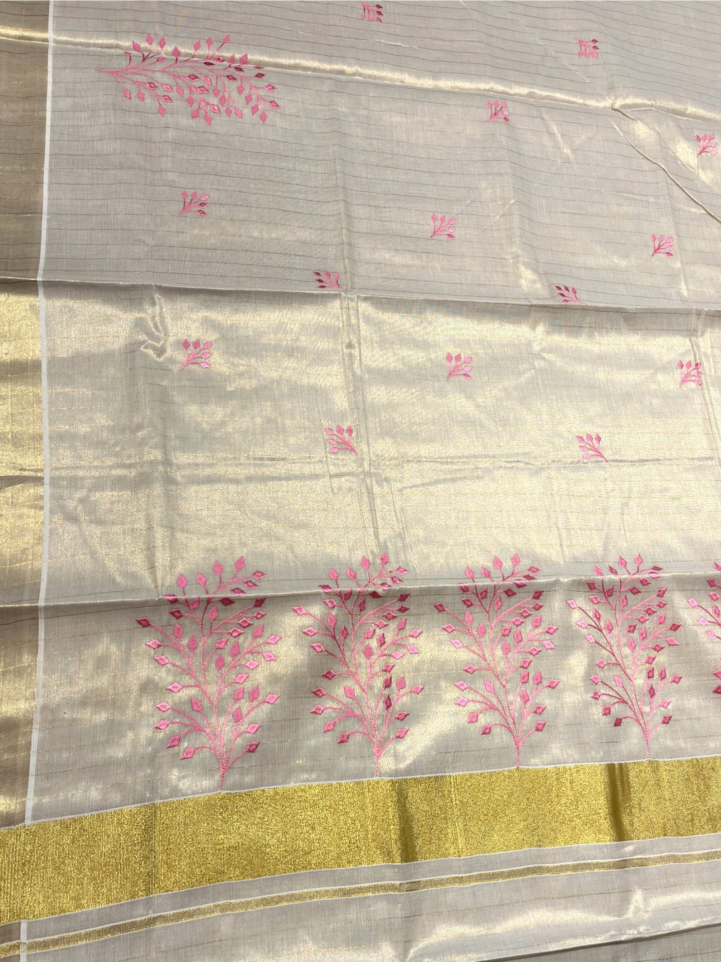 Southloom Tissue Kerala Kasavu Saree with Floral Embroidery Design