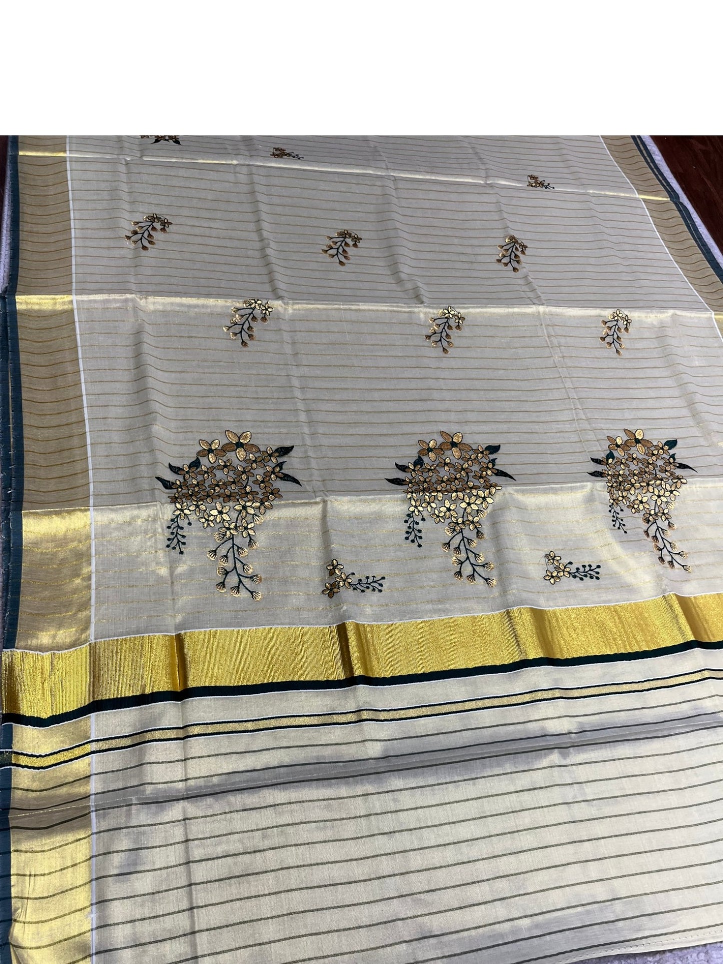 Southloom Kerala Tissue Kasavu Lines Saree with Kanikonna Floral Embroidery Designs on Body